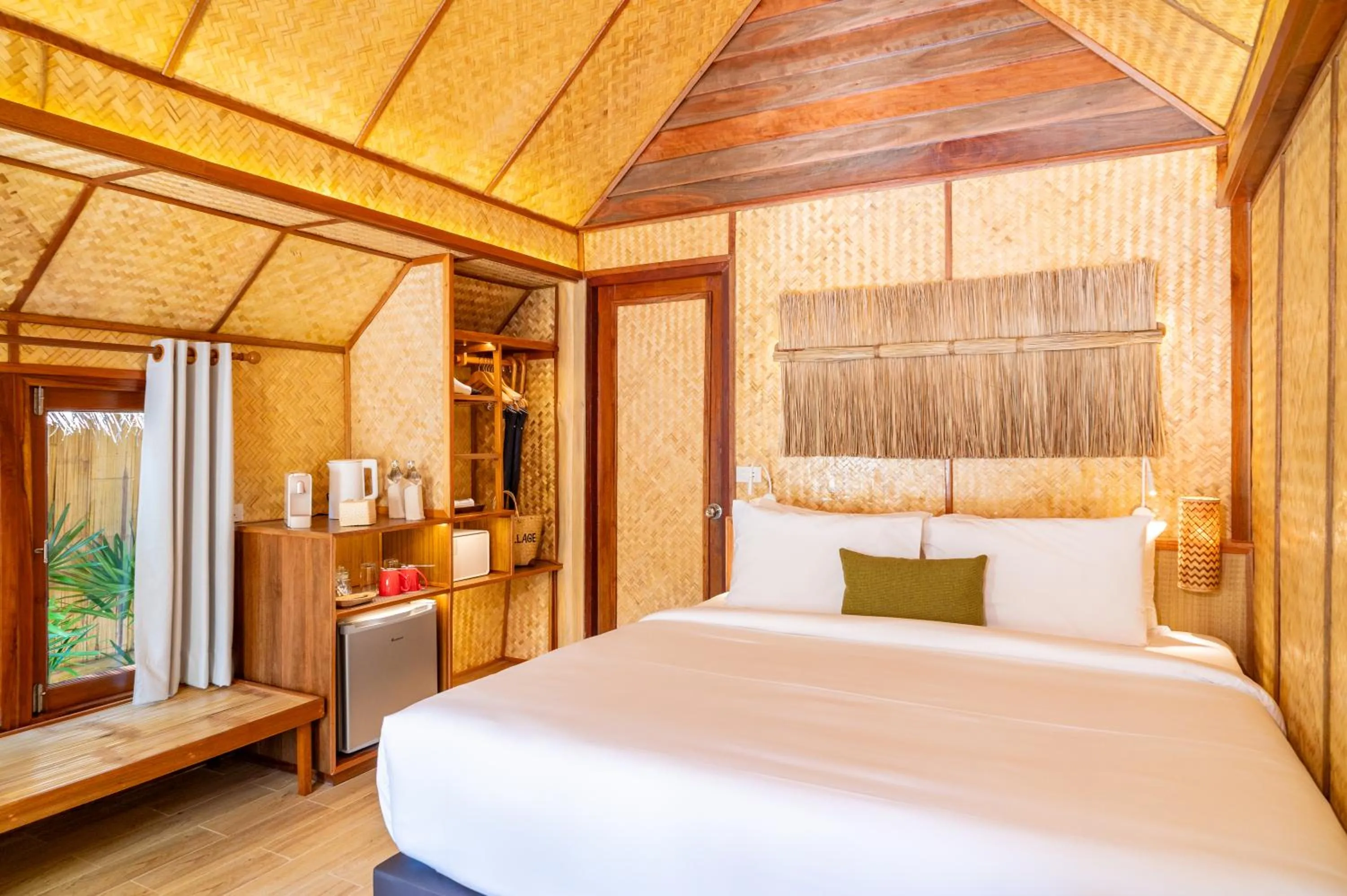 Bed in Pai Village Boutique Resort