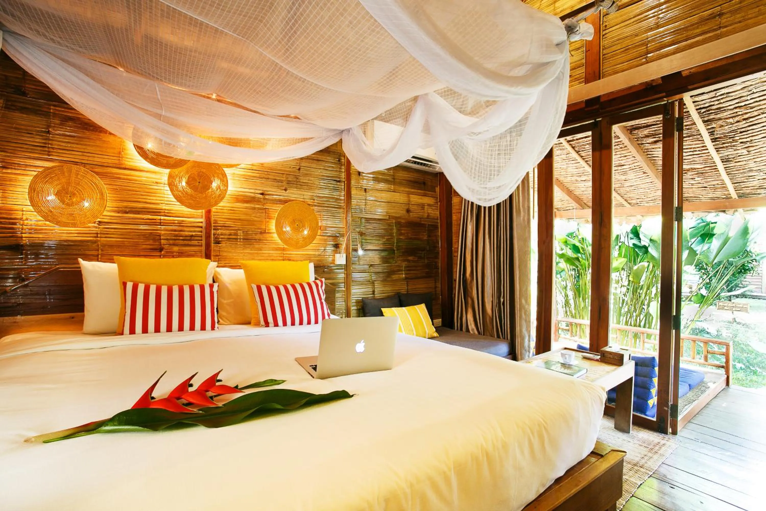 Bed in Pai Village Boutique Resort