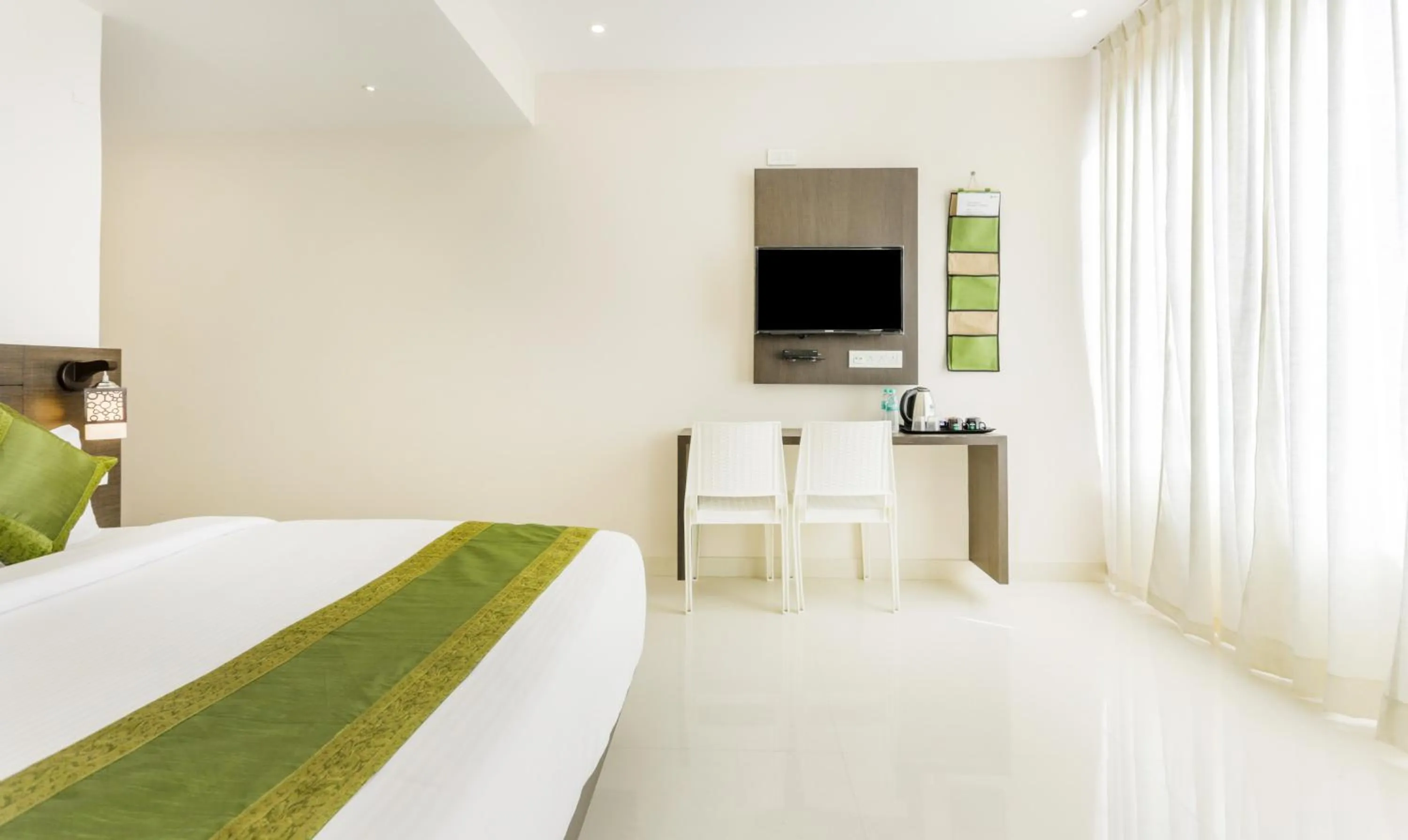 Bedroom, Bed in Treebo Sunrise IG Road