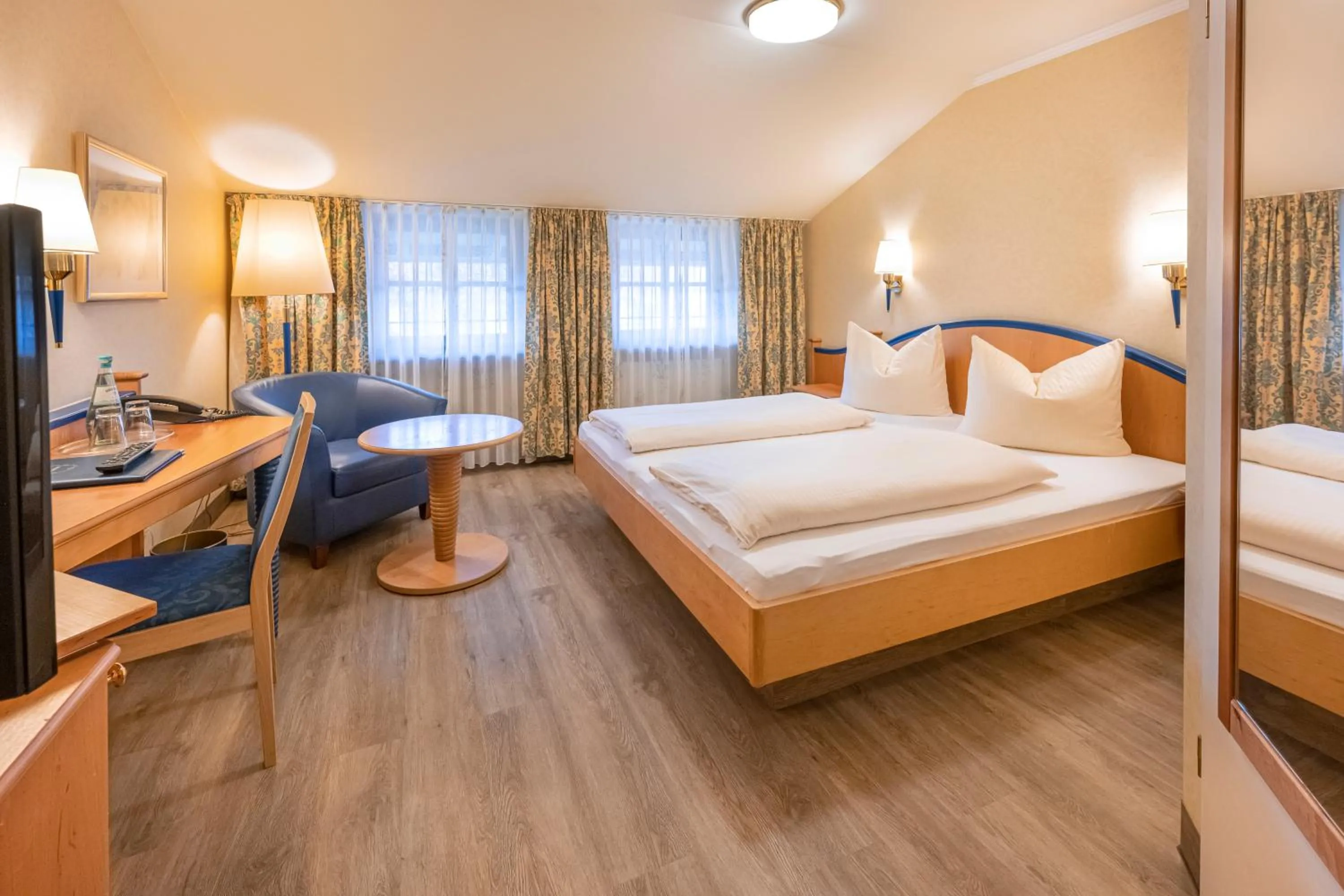 Bed in Hotel Neuwirt