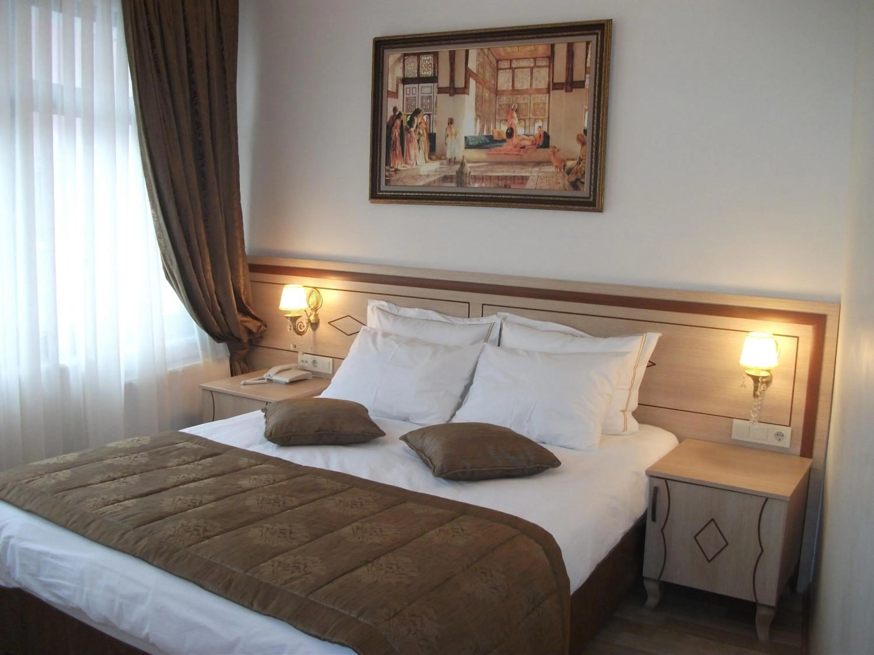 Bed in Sultan Palace Hotel