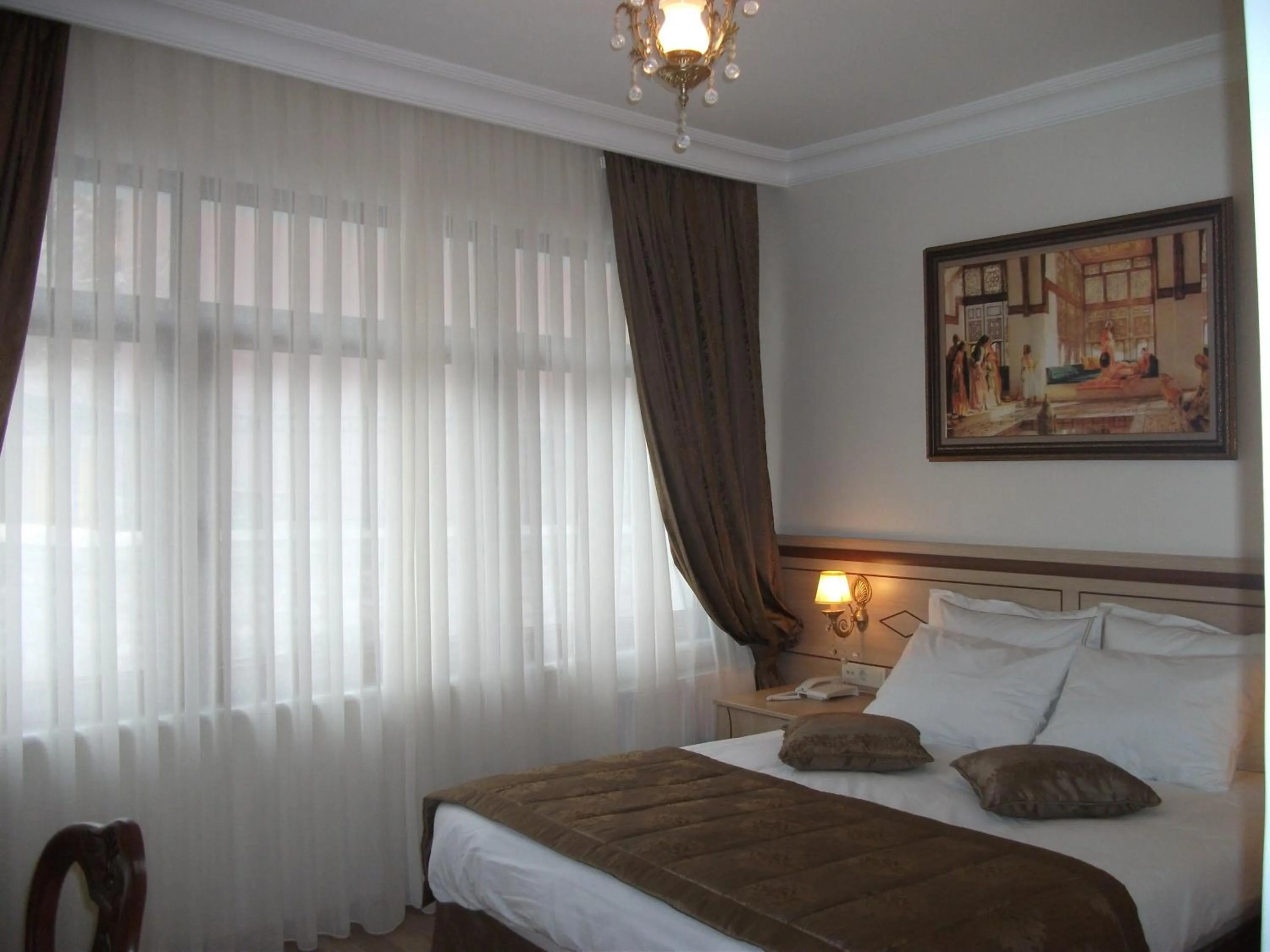 Bed in Sultan Palace Hotel