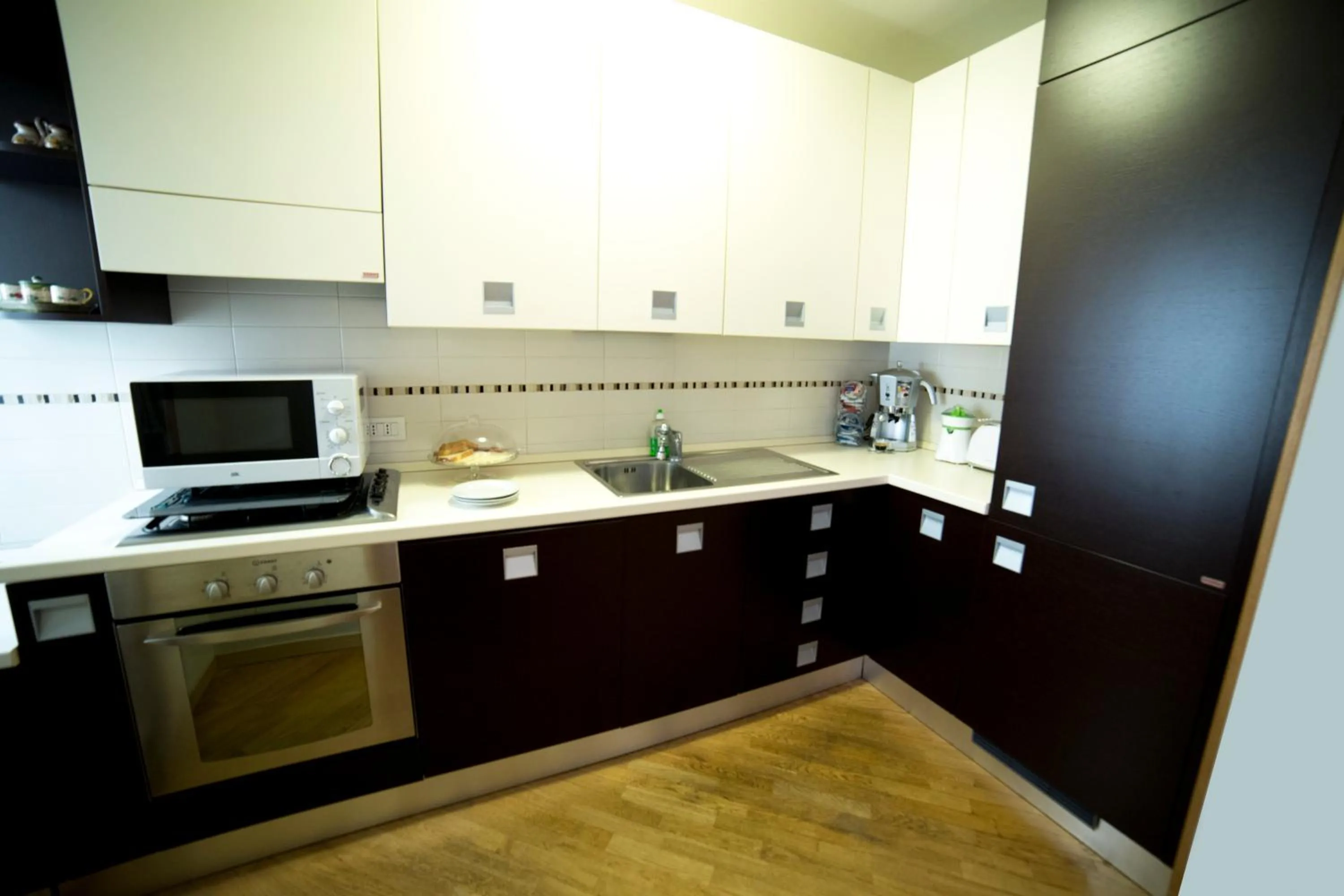Kitchen or kitchenette in B&B Terrazza Baires - in the heart of Milan