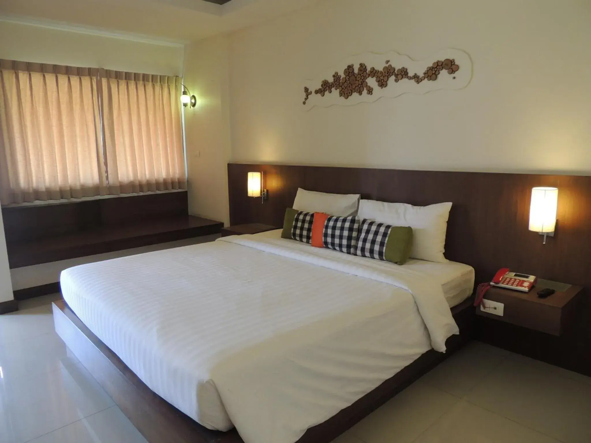 Bed in The Charm Boutique Resort Bed in The Charm Boutique Resort