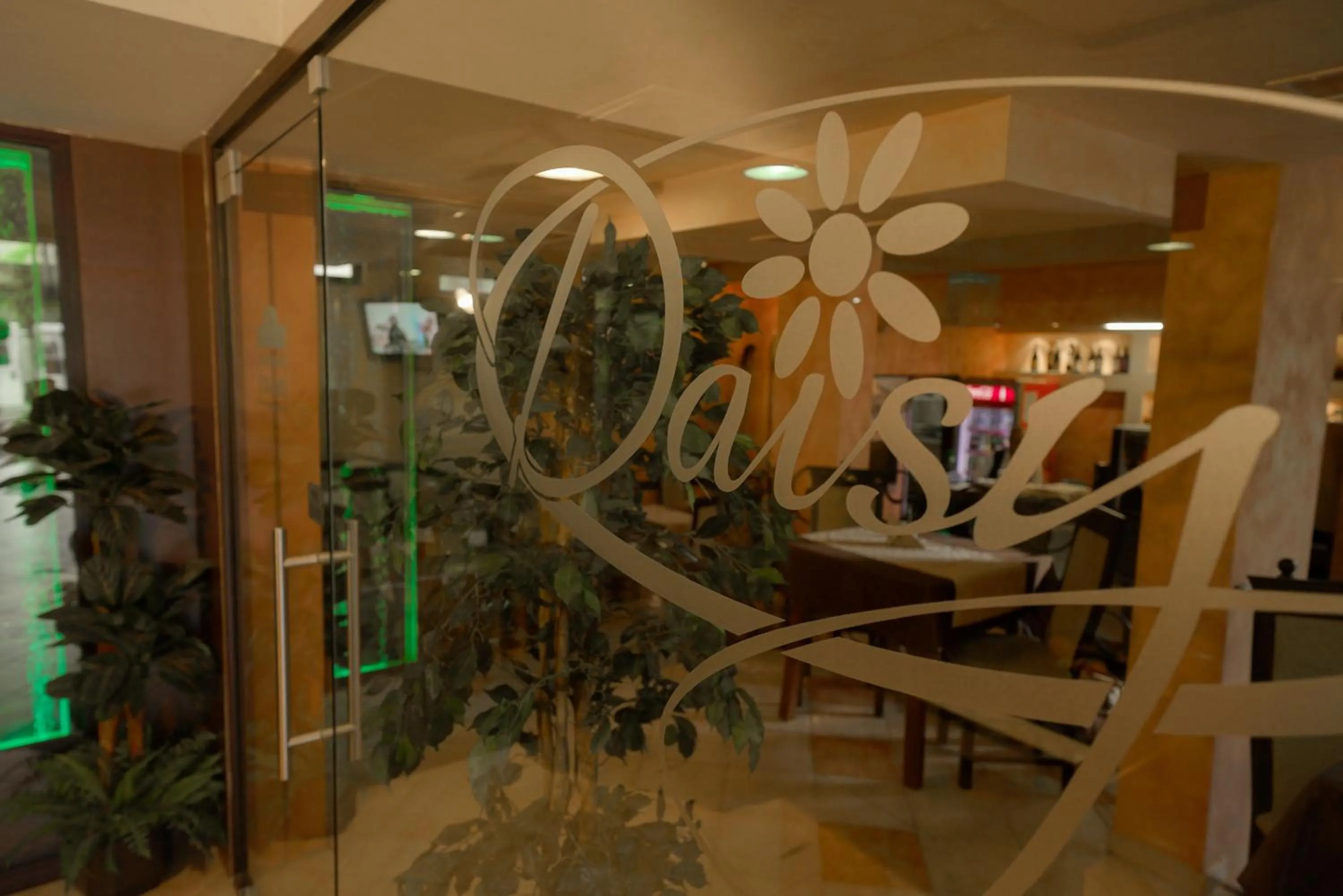 Property logo or sign in Apart Hotel Flora Residence Daisy