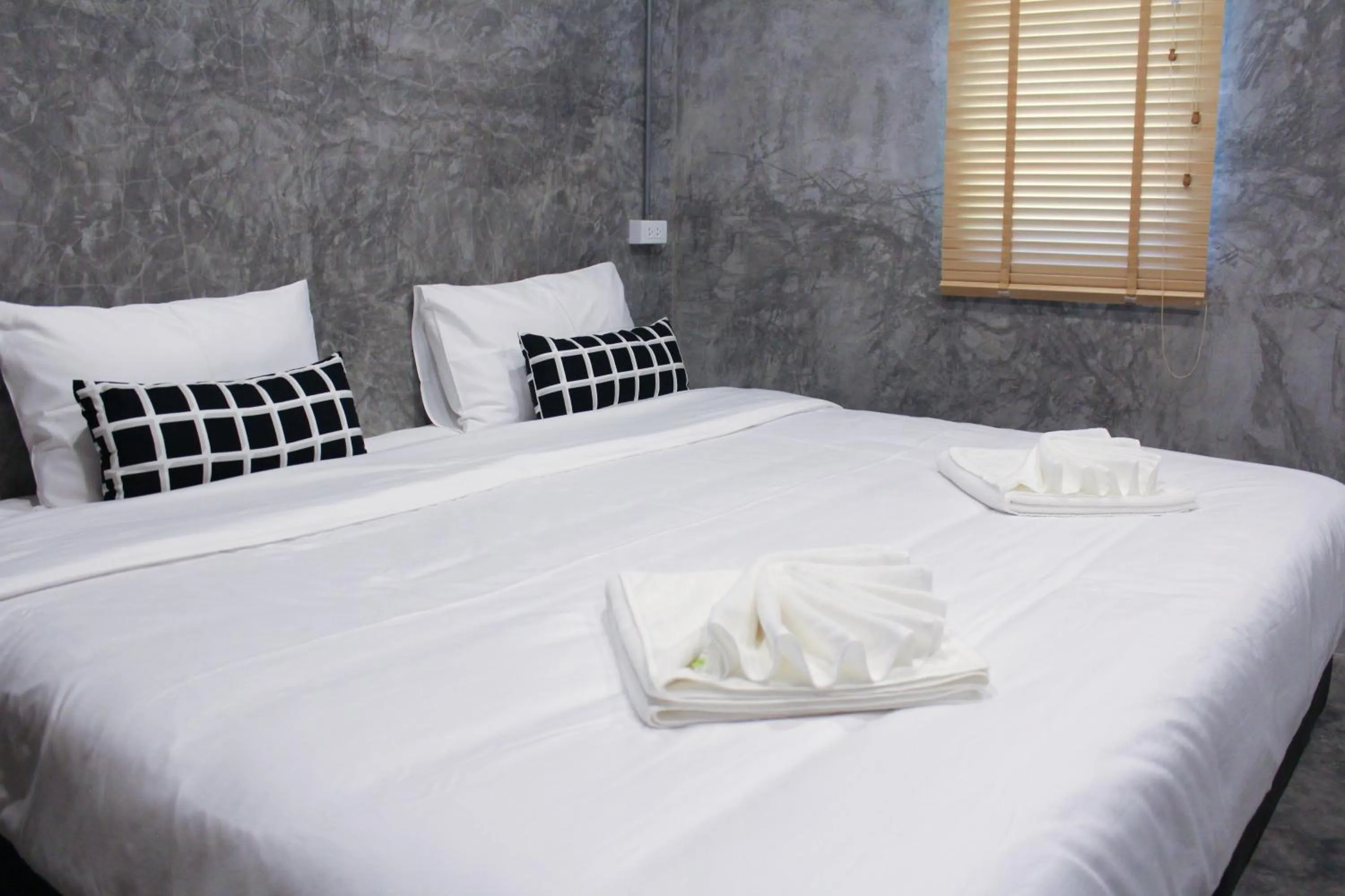 Bed in The Simple Koh Yao Noi