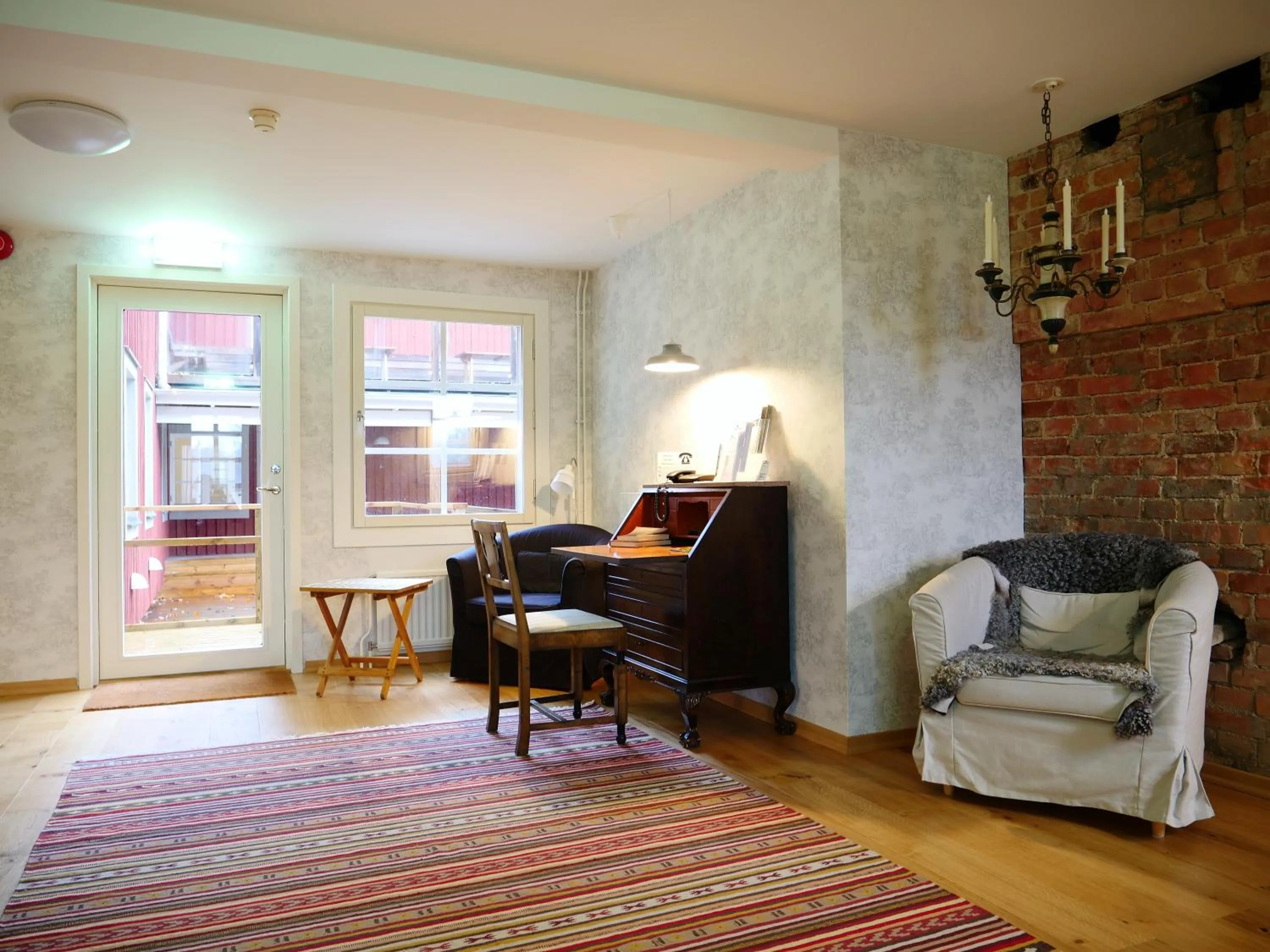 Communal lounge/ TV room in Ödevata Gårdshotell