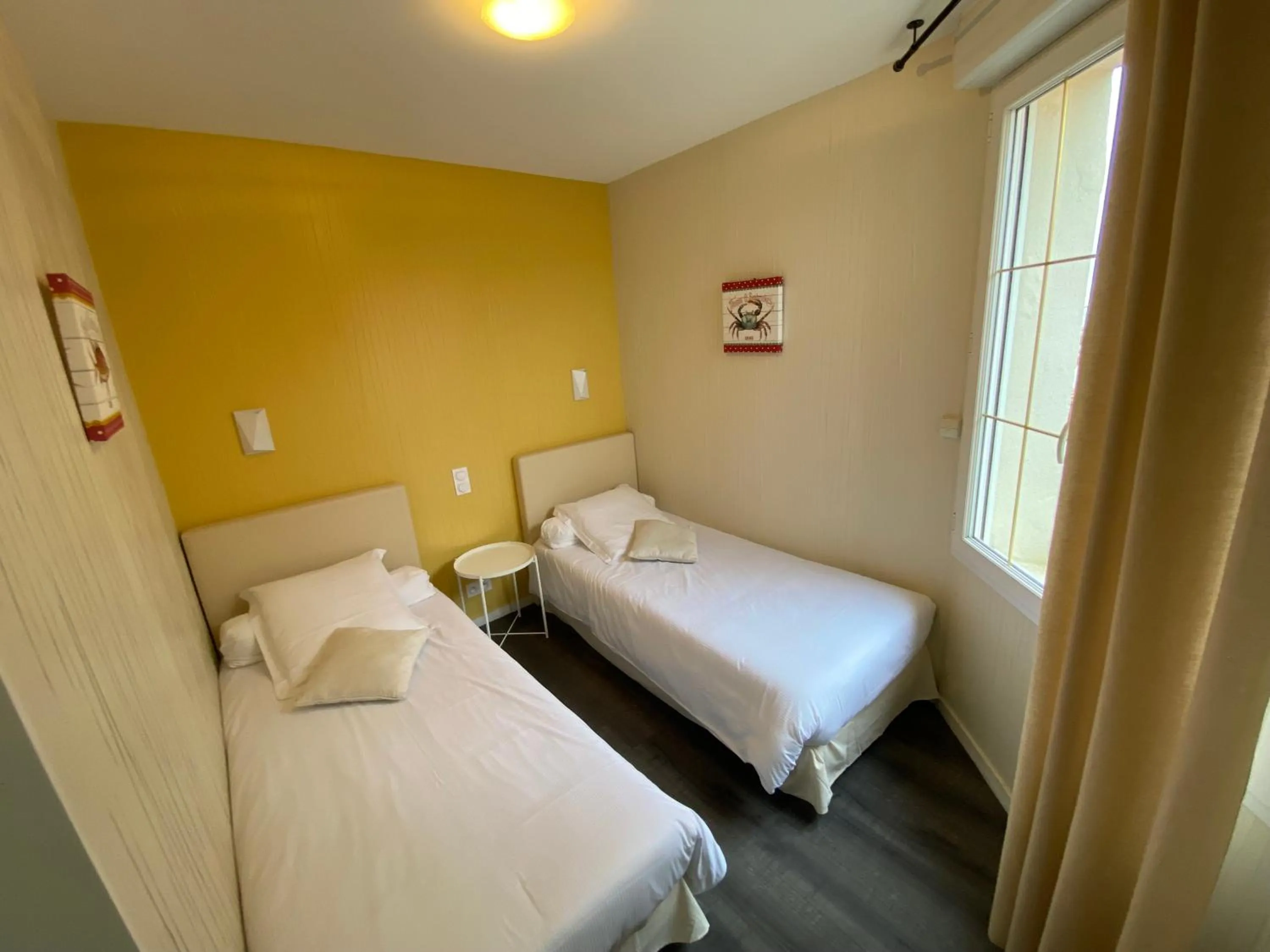 Bed in Hôtel de charme & SPA Le Grand Large