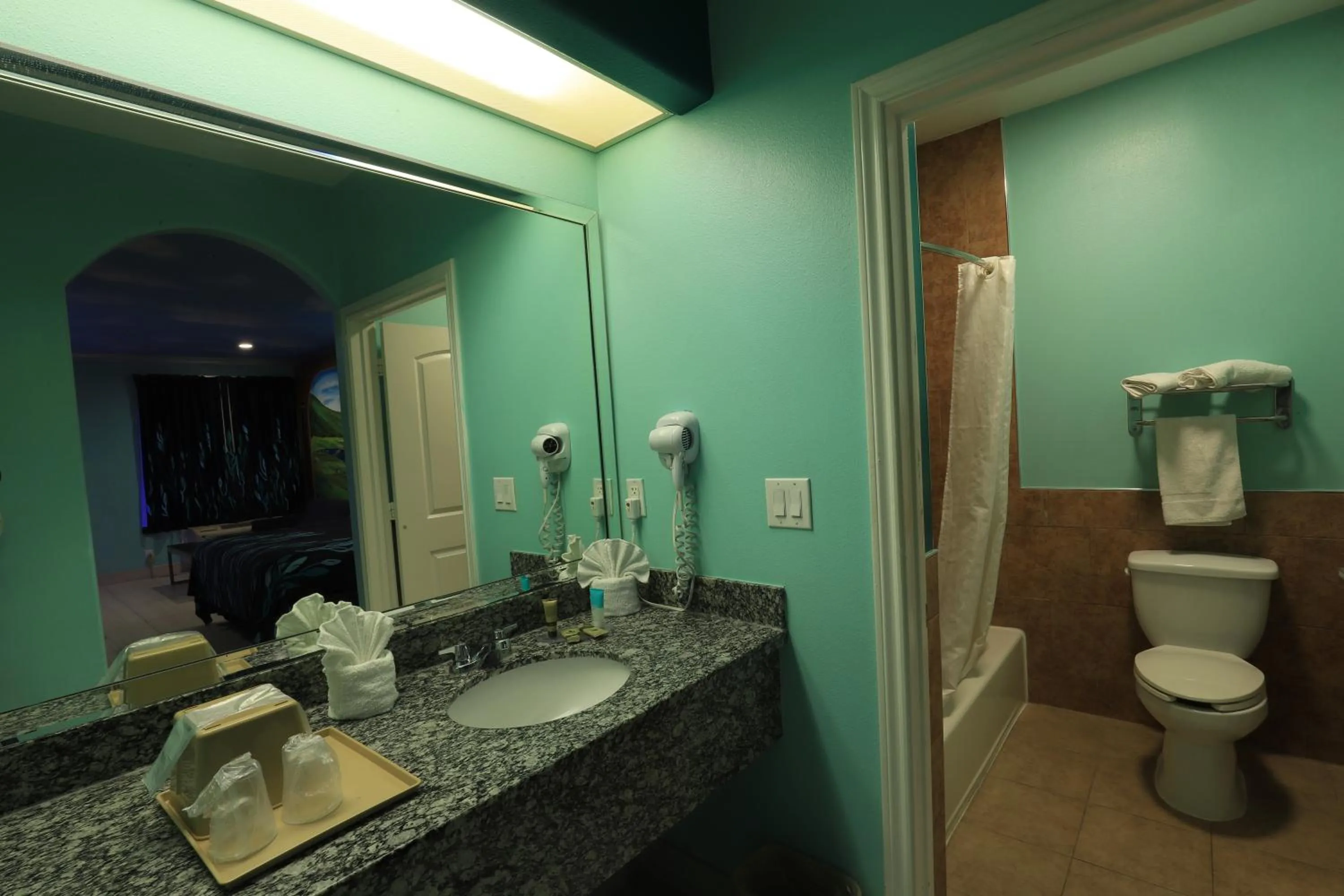 Bathroom in Scottish Inn and Suites Houston-Jones Road