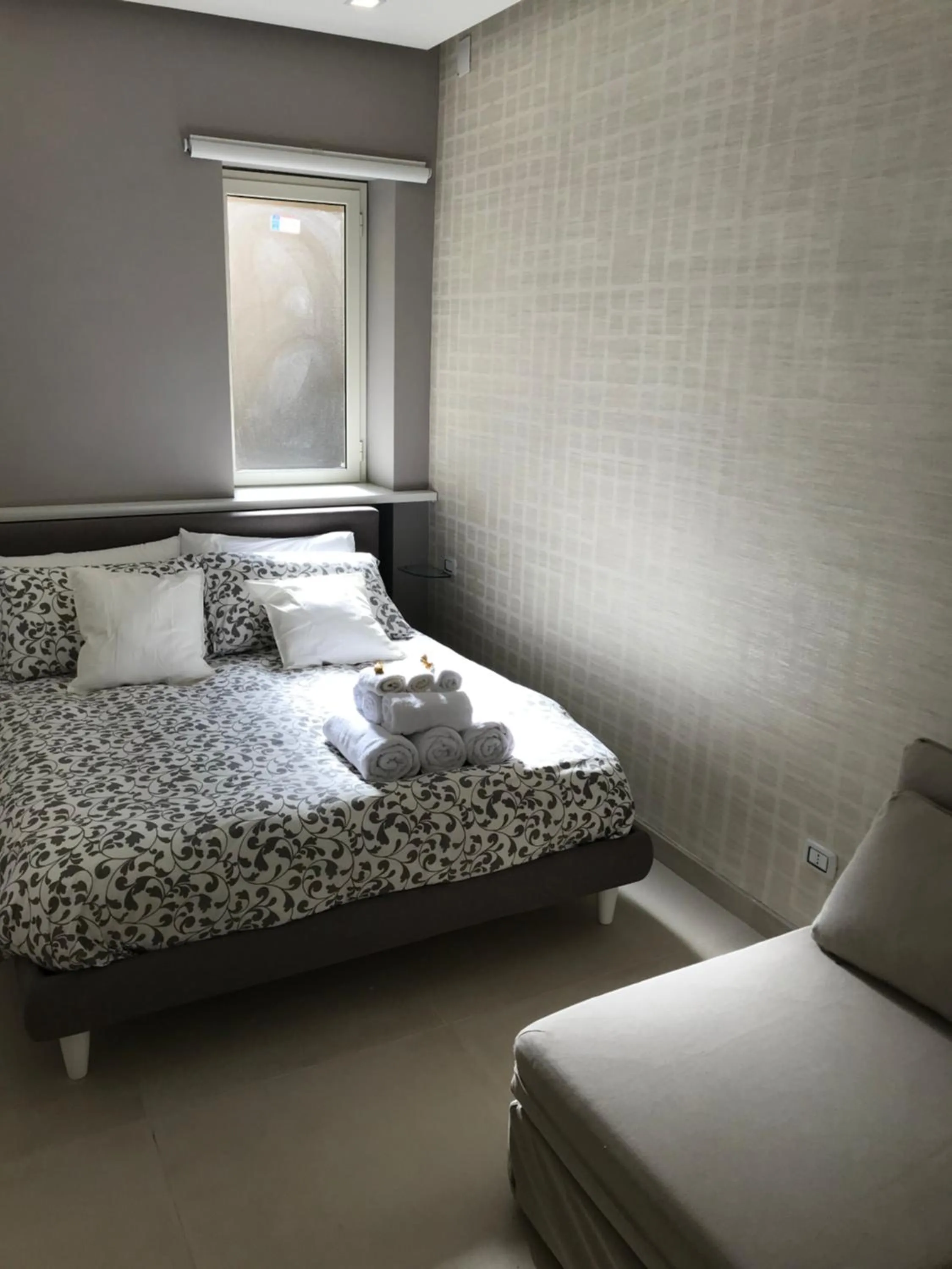 Bedroom, Bed in Terrazza Aragon Room and SPA