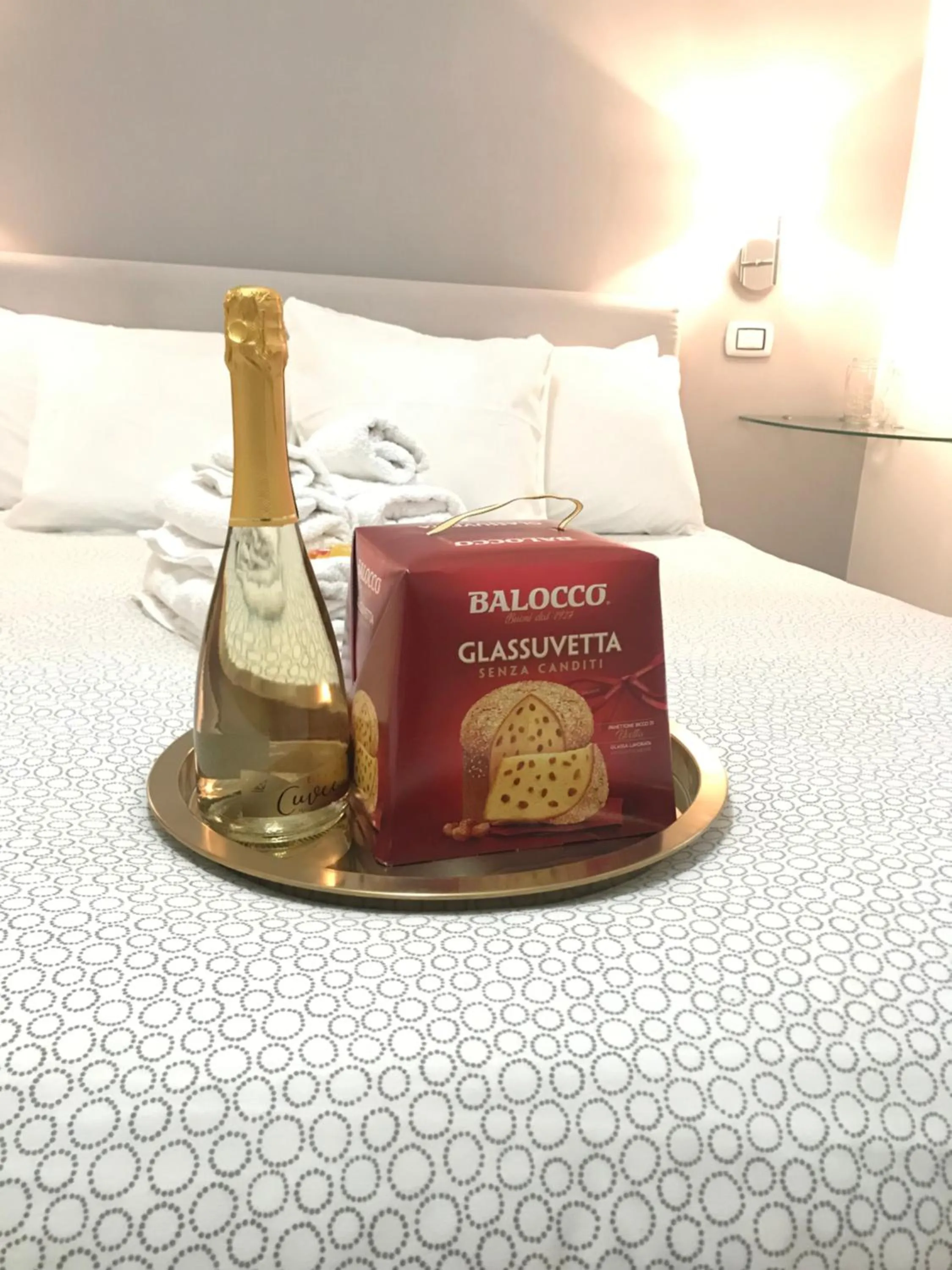 Bed in Terrazza Aragon Room and SPA