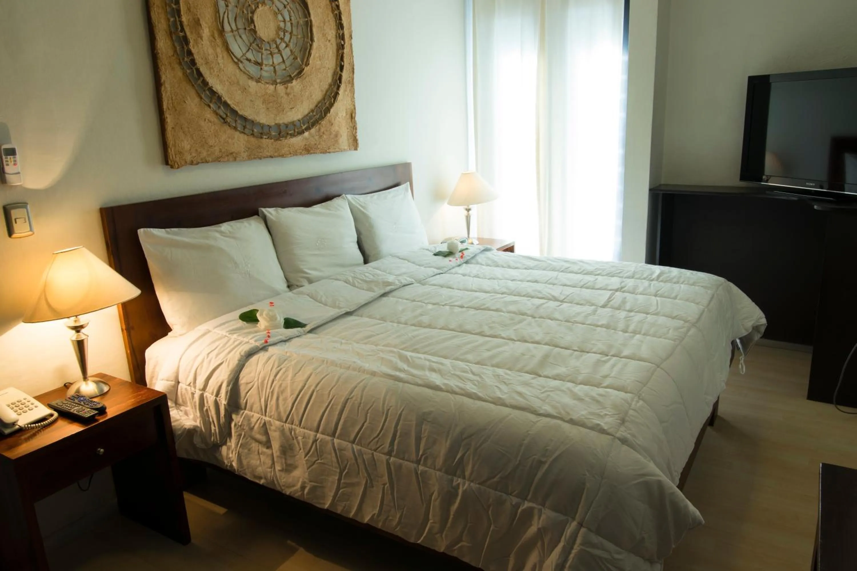 Bed in Hotel Casa Divina Oaxaca