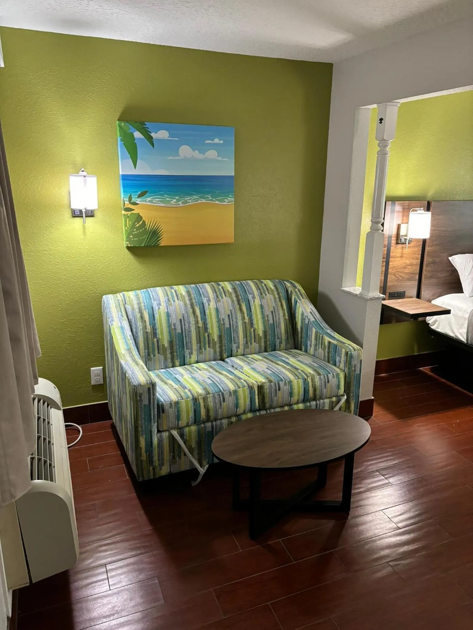 Seating area, Bed in Travelodge by Wyndham Hotel & Cottages St Augustine - Historic