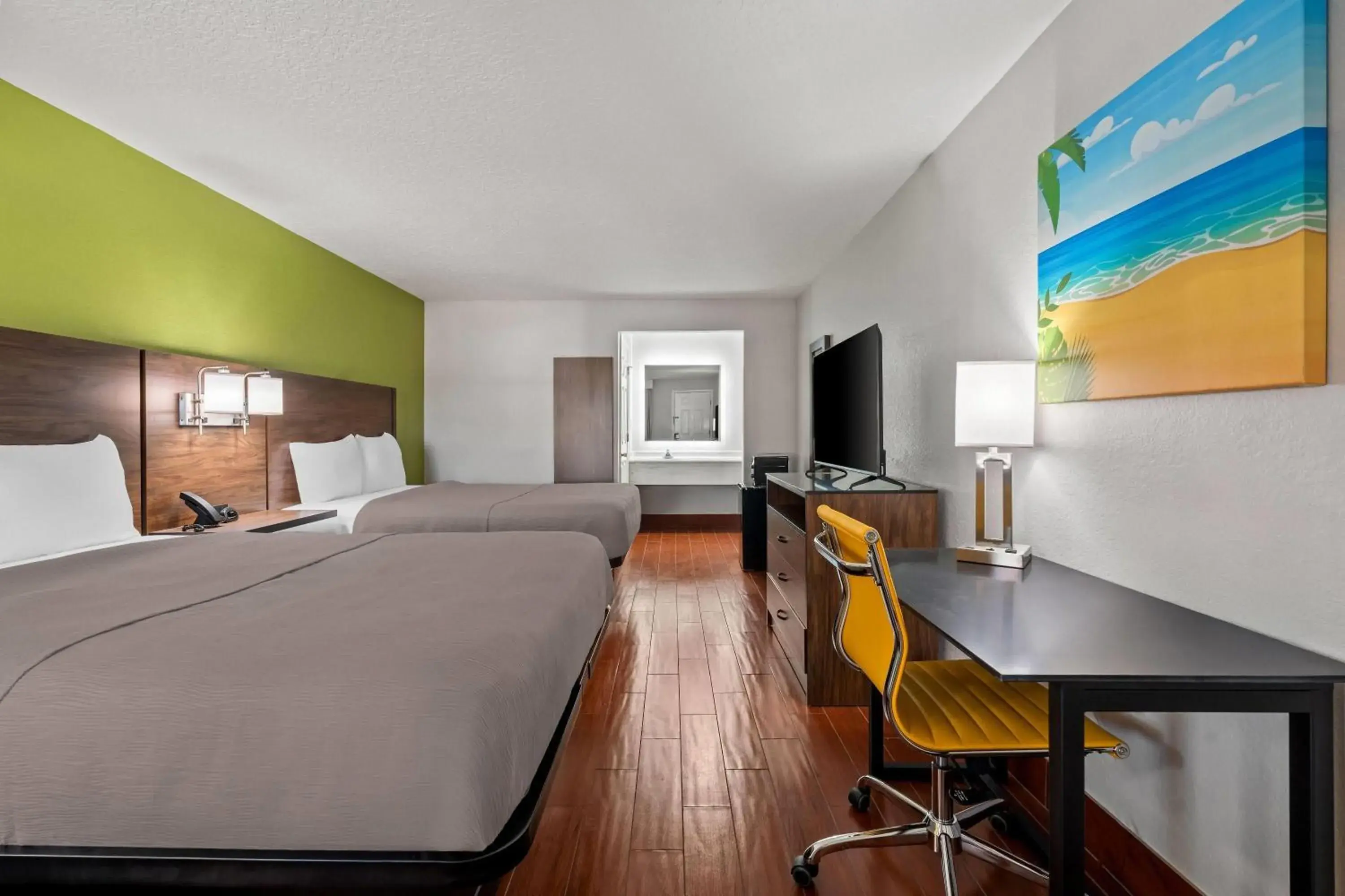 Queen Room with Two Queen Beds - Non-Smoking in Travelodge by Wyndham Hotel & Cottages St Augustine - Historic Queen Room with Two Queen Beds - Non-Smoking in Travelodge by Wyndham Hotel & Cottages St Augustine - Historic