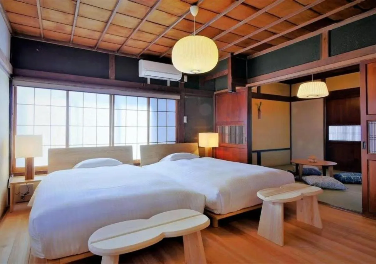 Bed in NIPPONIA Sawara Merchant Town Hotel