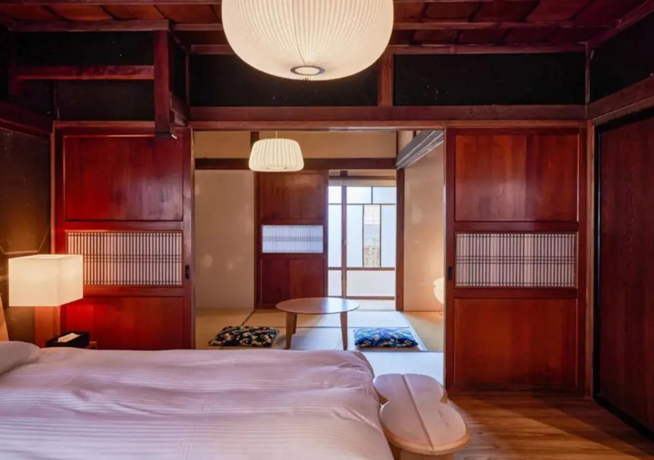 Bed in NIPPONIA Sawara Merchant Town Hotel