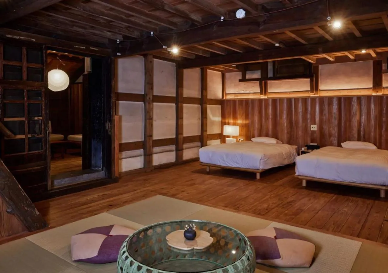 Bed in NIPPONIA Sawara Merchant Town Hotel