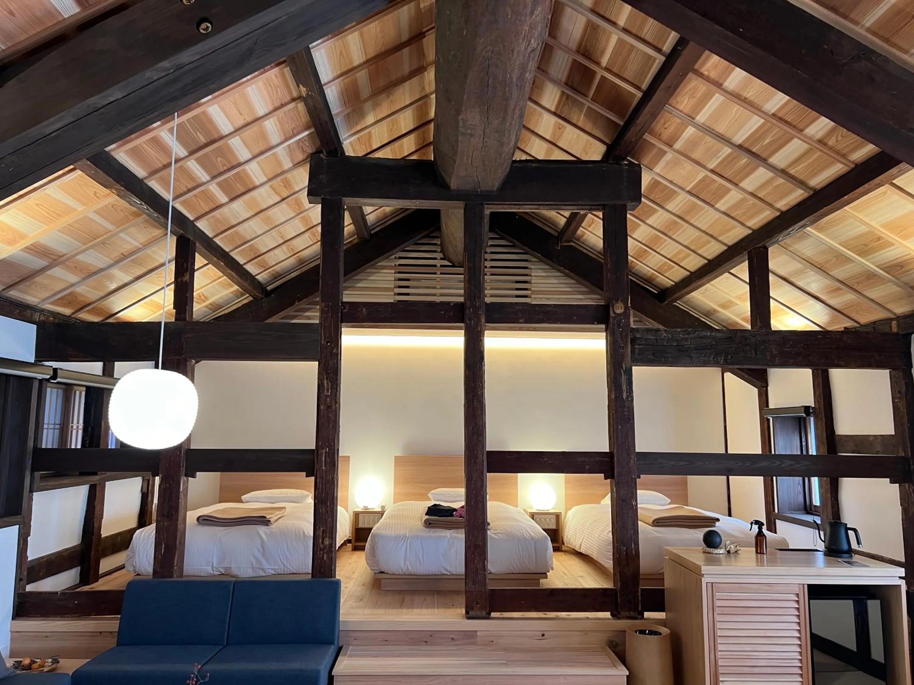 Bed in NIPPONIA Sawara Merchant Town Hotel