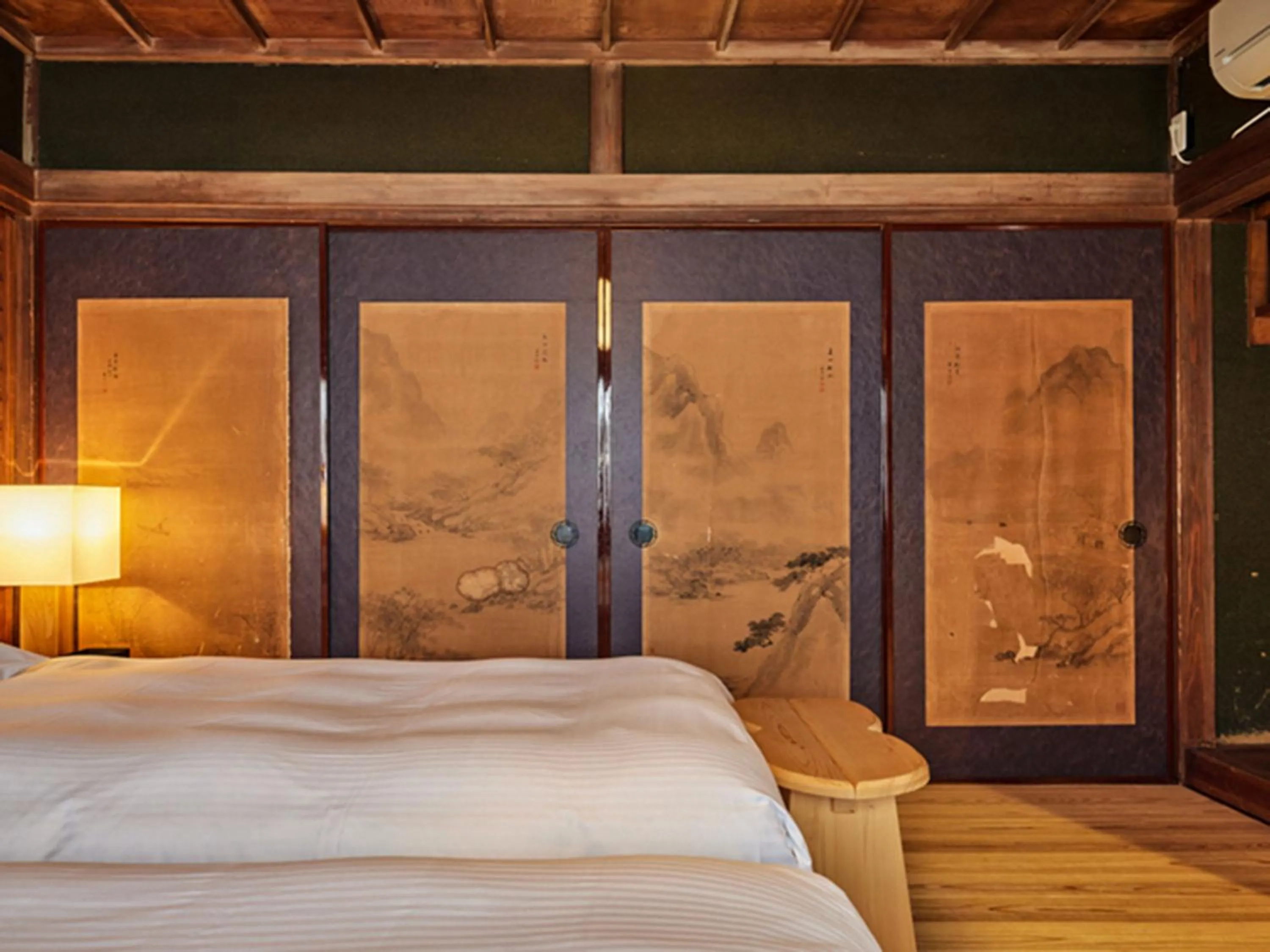 Bed in NIPPONIA Sawara Merchant Town Hotel