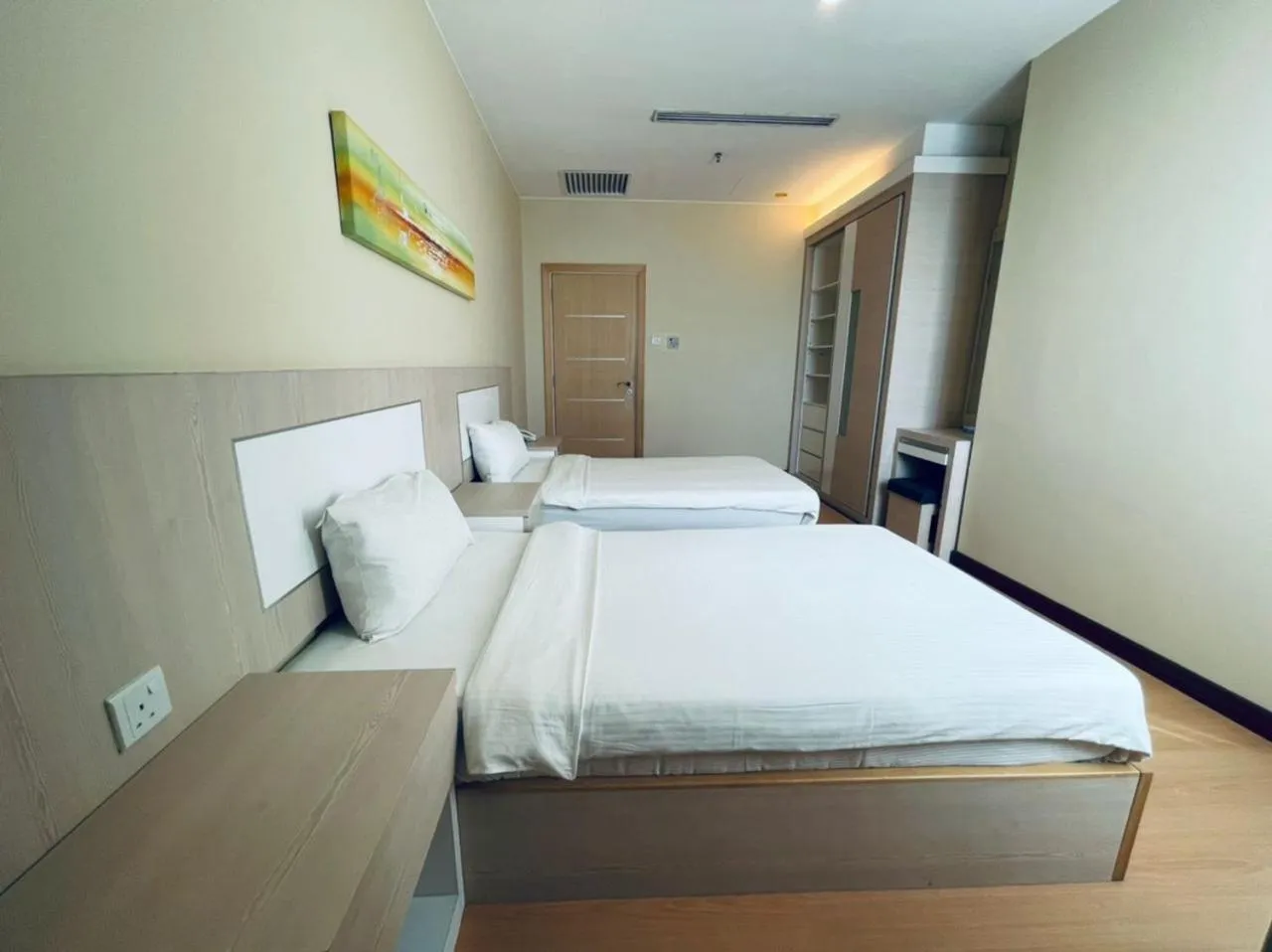 Bed in Jinhold Apartment Hotel