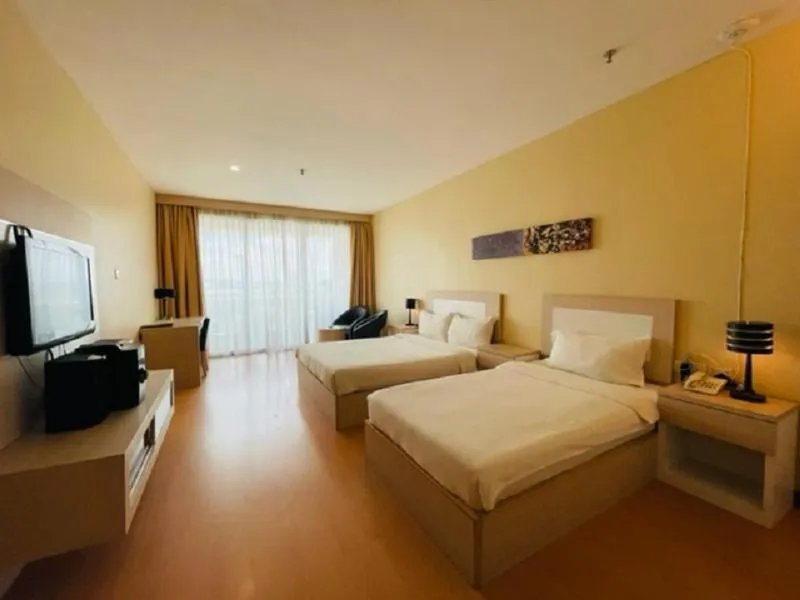 Bed in Jinhold Apartment Hotel