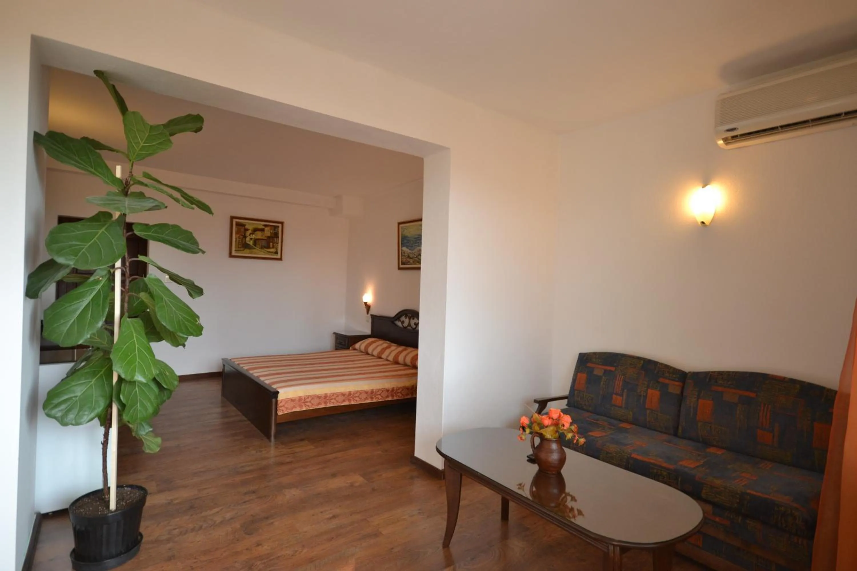 Living room, Bed in More Family Hotel