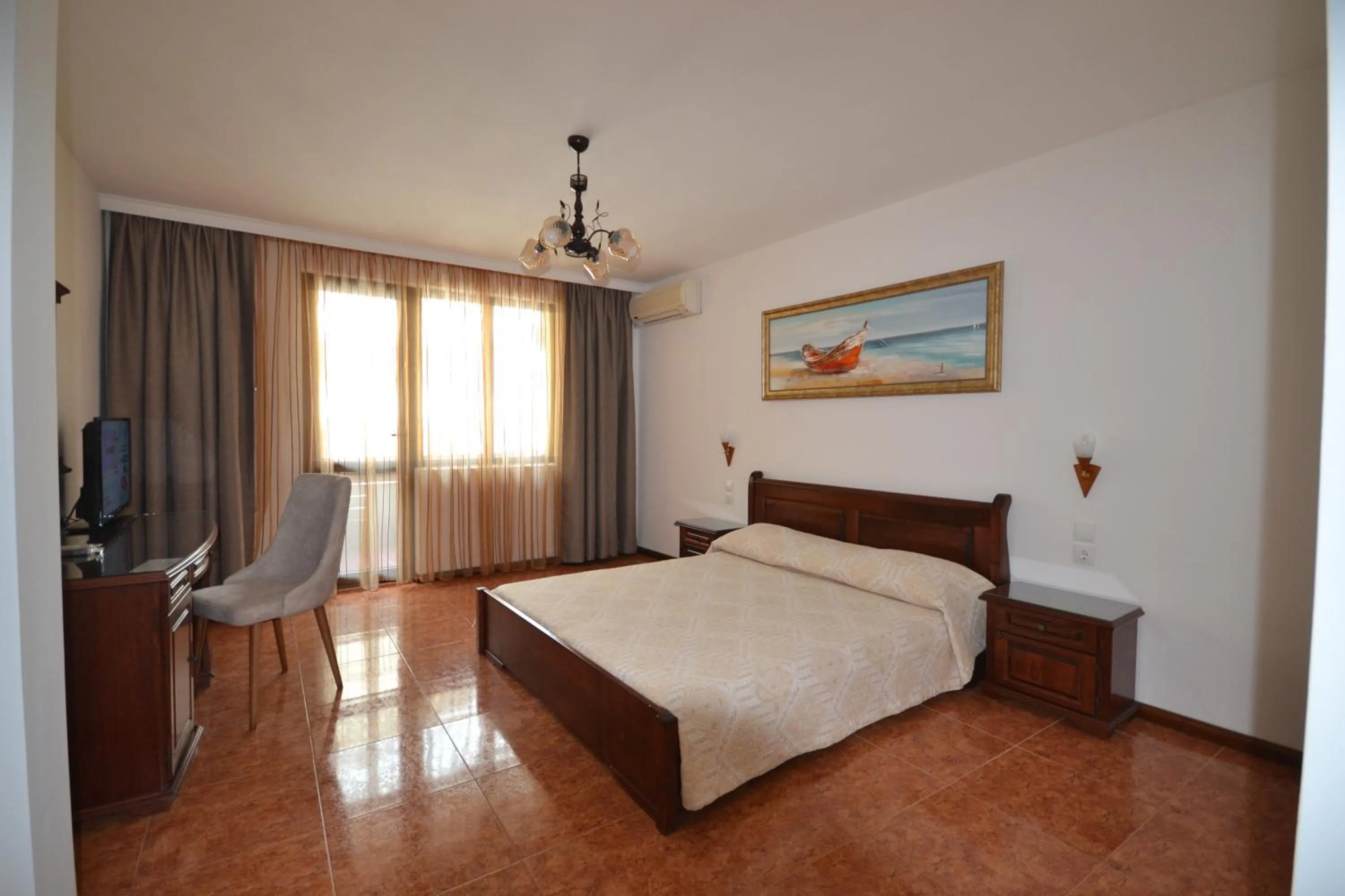 Living room, Bed in More Family Hotel