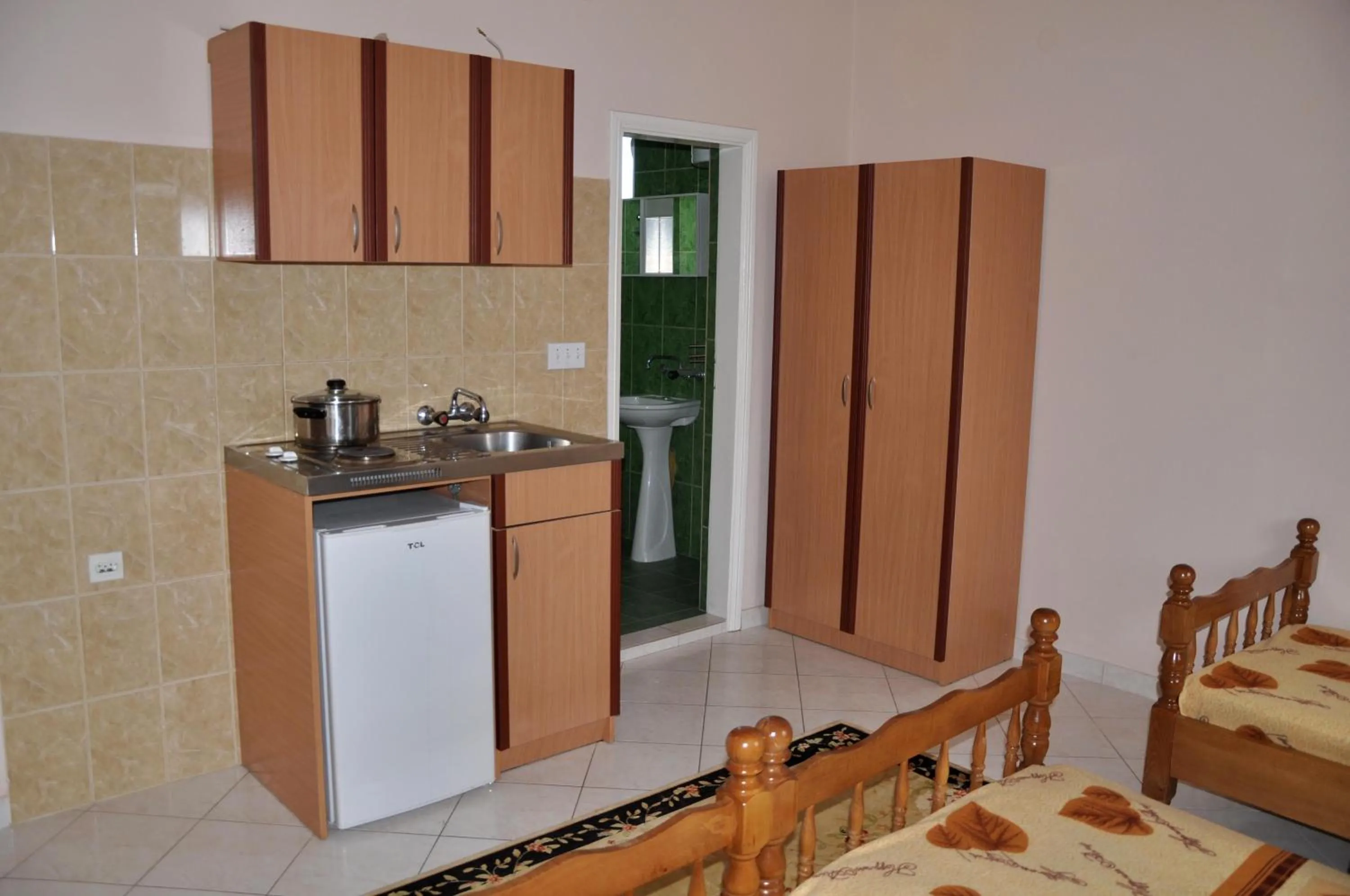 Kitchen or kitchenette in Apartments Perezaj