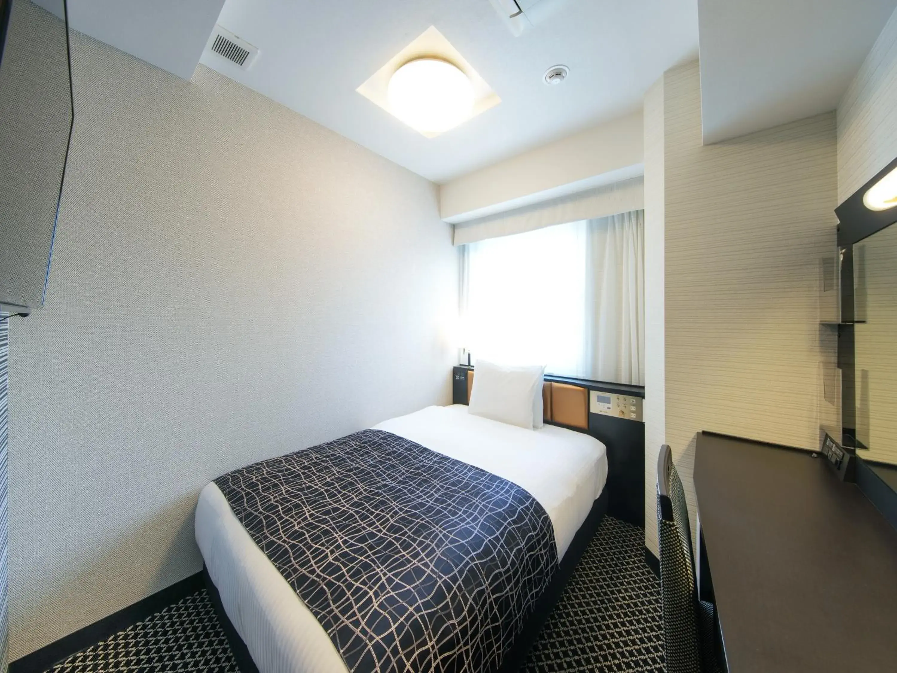 Bed in APA Hotel Higashi Umeda Minami Morimachi Ekimae Bed in APA Hotel Higashi Umeda Minami Morimachi Ekimae