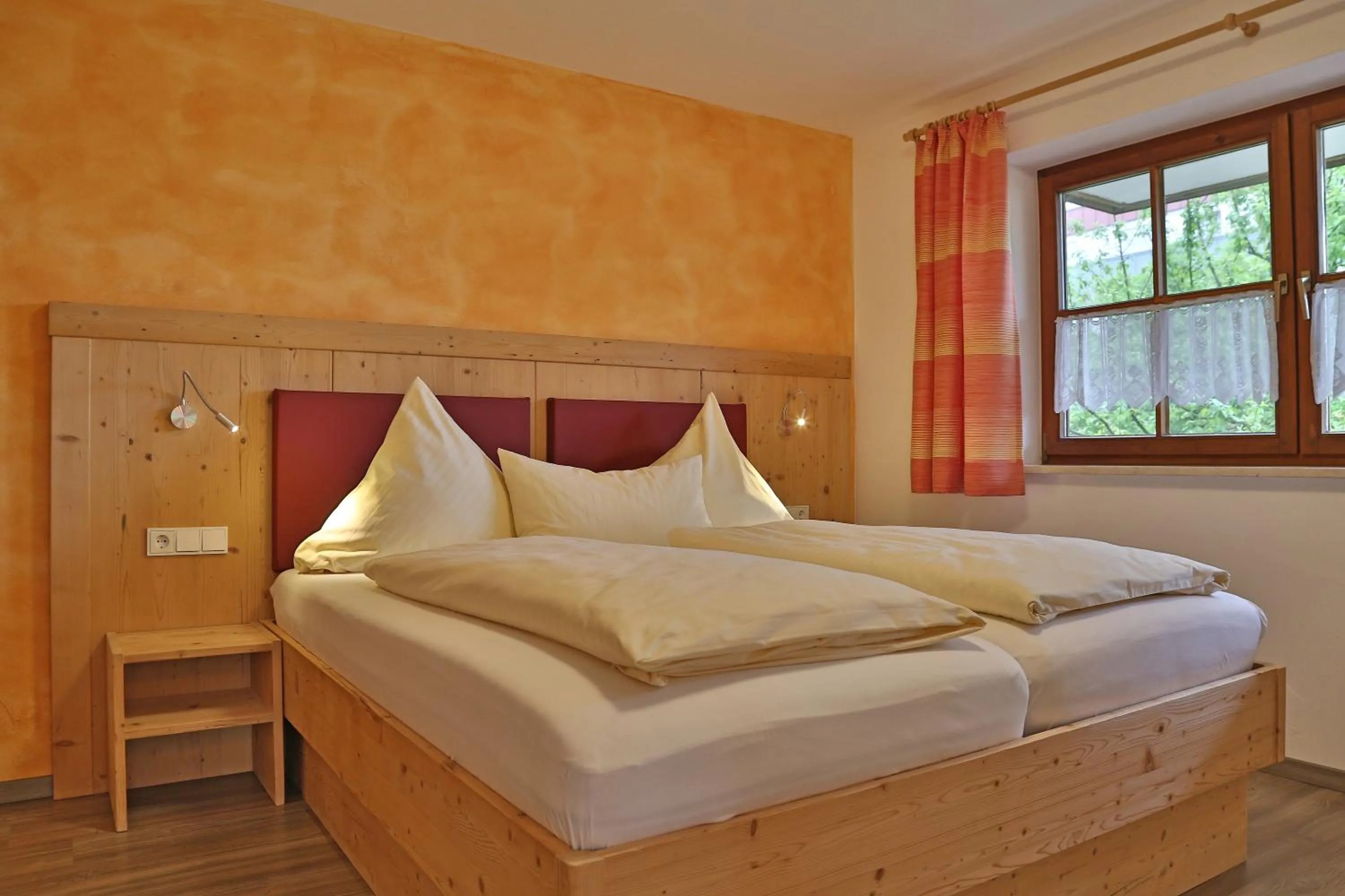 Bed in Alpenstern Finy, Bio-Gästehaus
