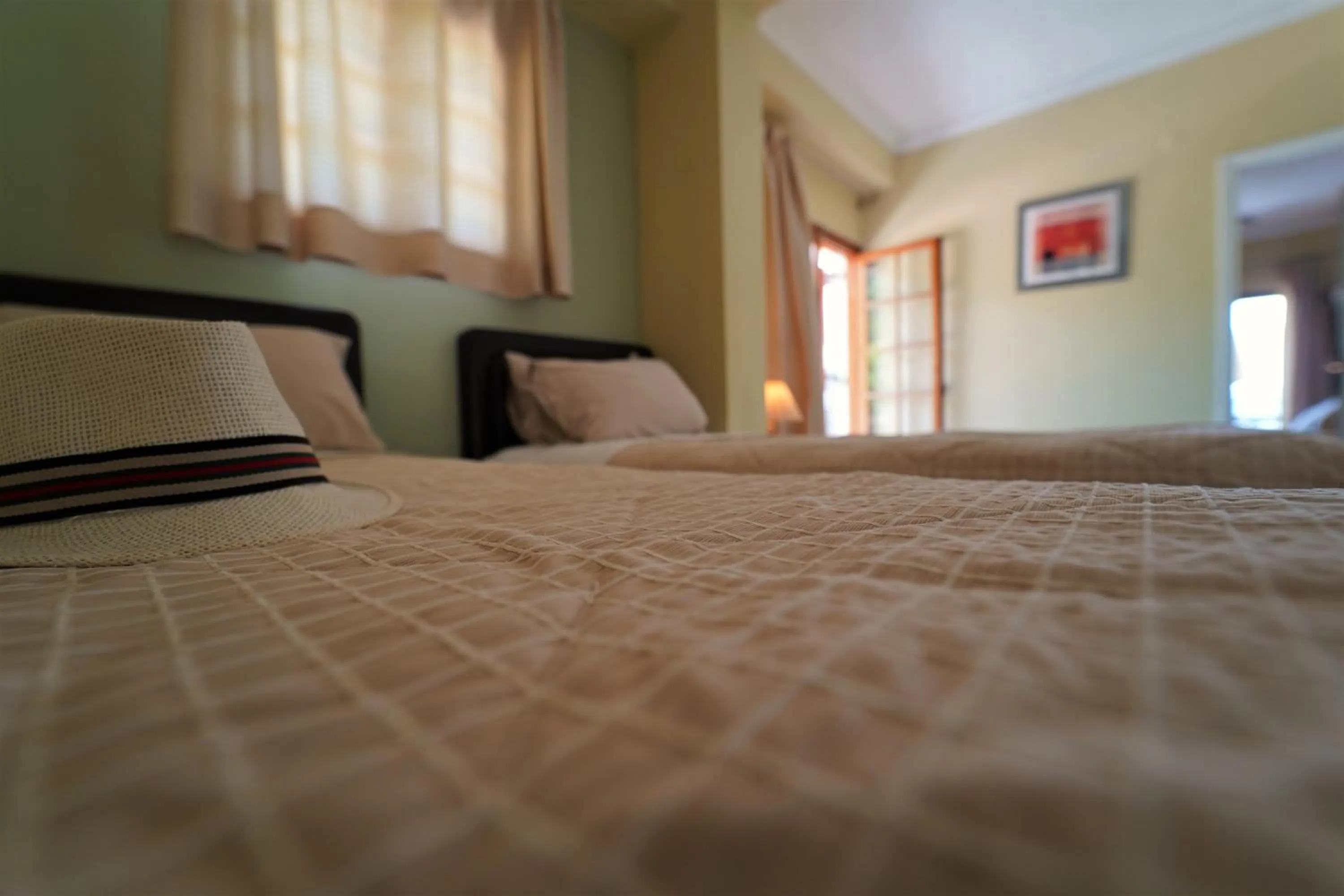 Bed in Bella Vista Hotel Studios & Apartments