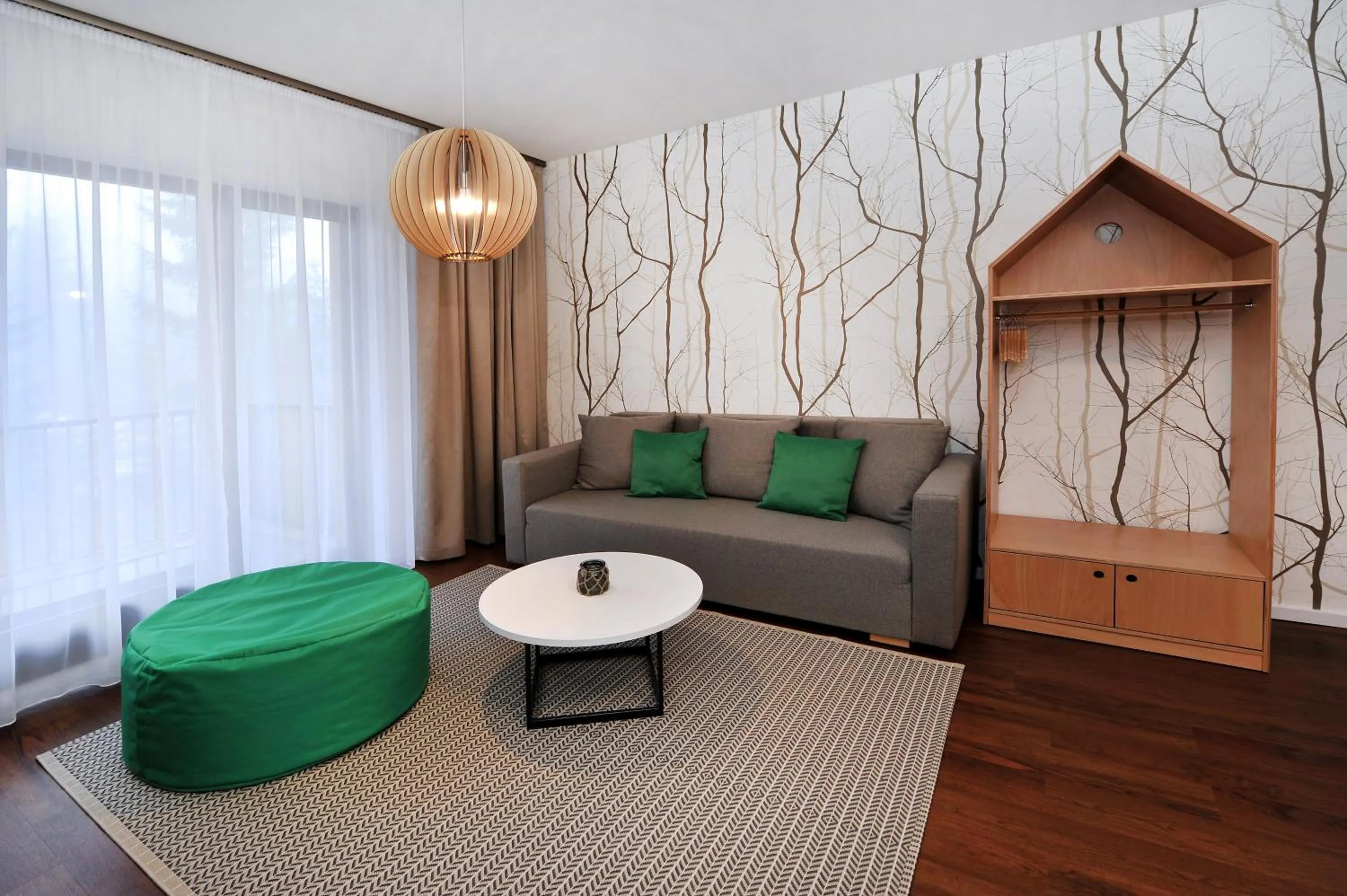 Living room in APLEND Vila Olívia