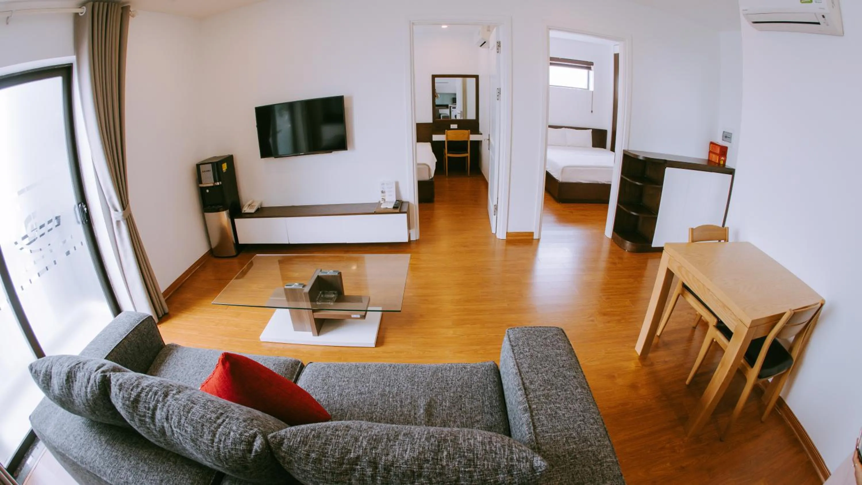 Communal lounge/ TV room, Bed in GM Hotel and Apartment