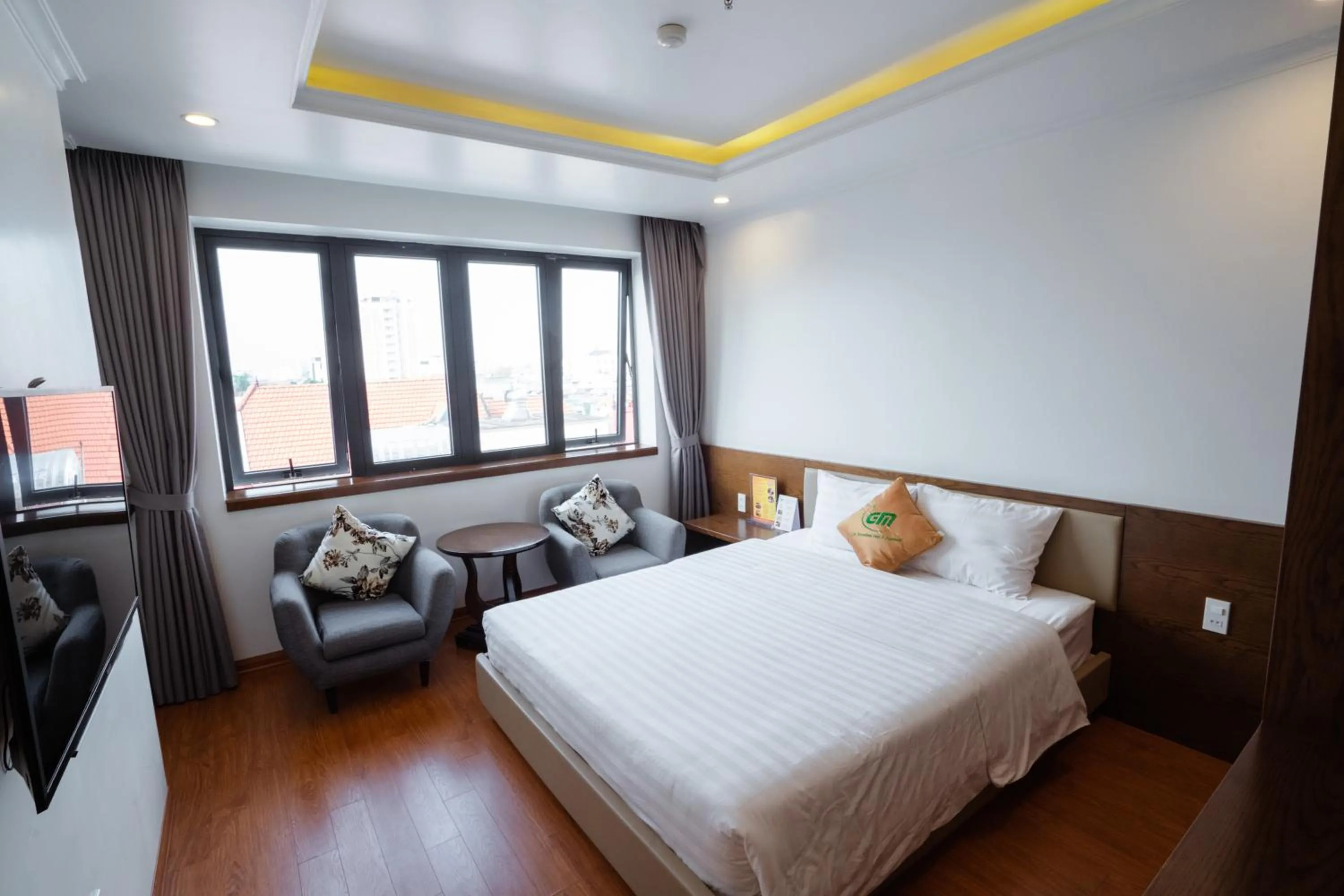 Photo of the whole room, Bed in GM Hotel and Apartment