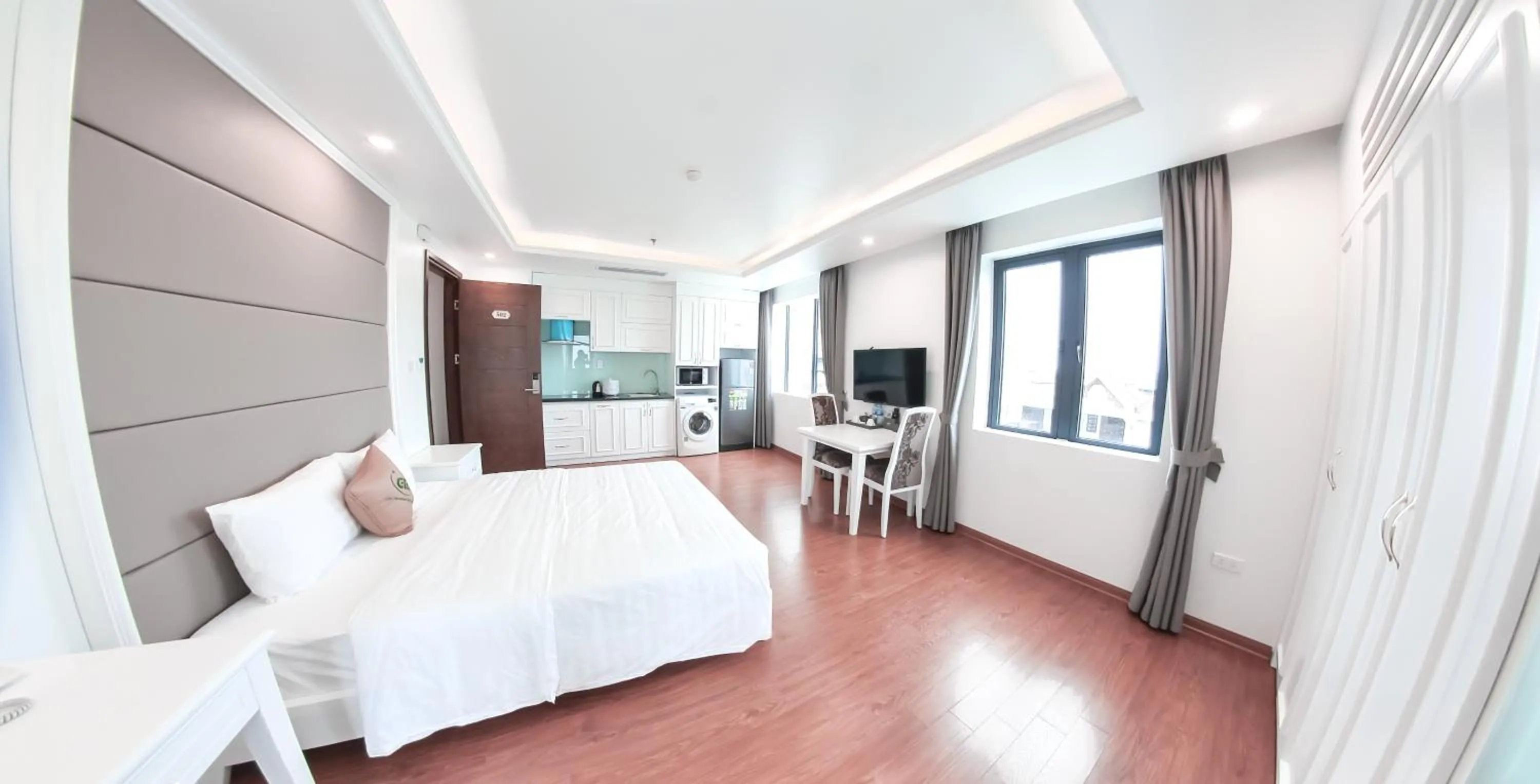 Living room, Bed in GM Hotel and Apartment