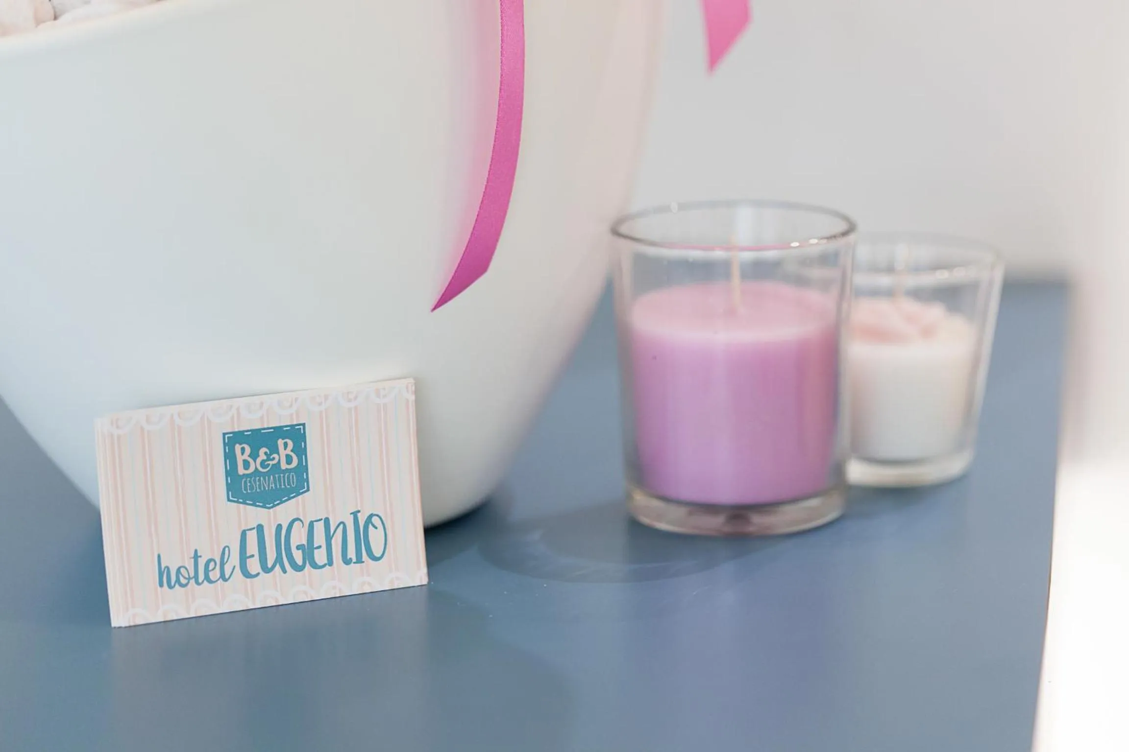 Property logo or sign in Hotel Eugenio