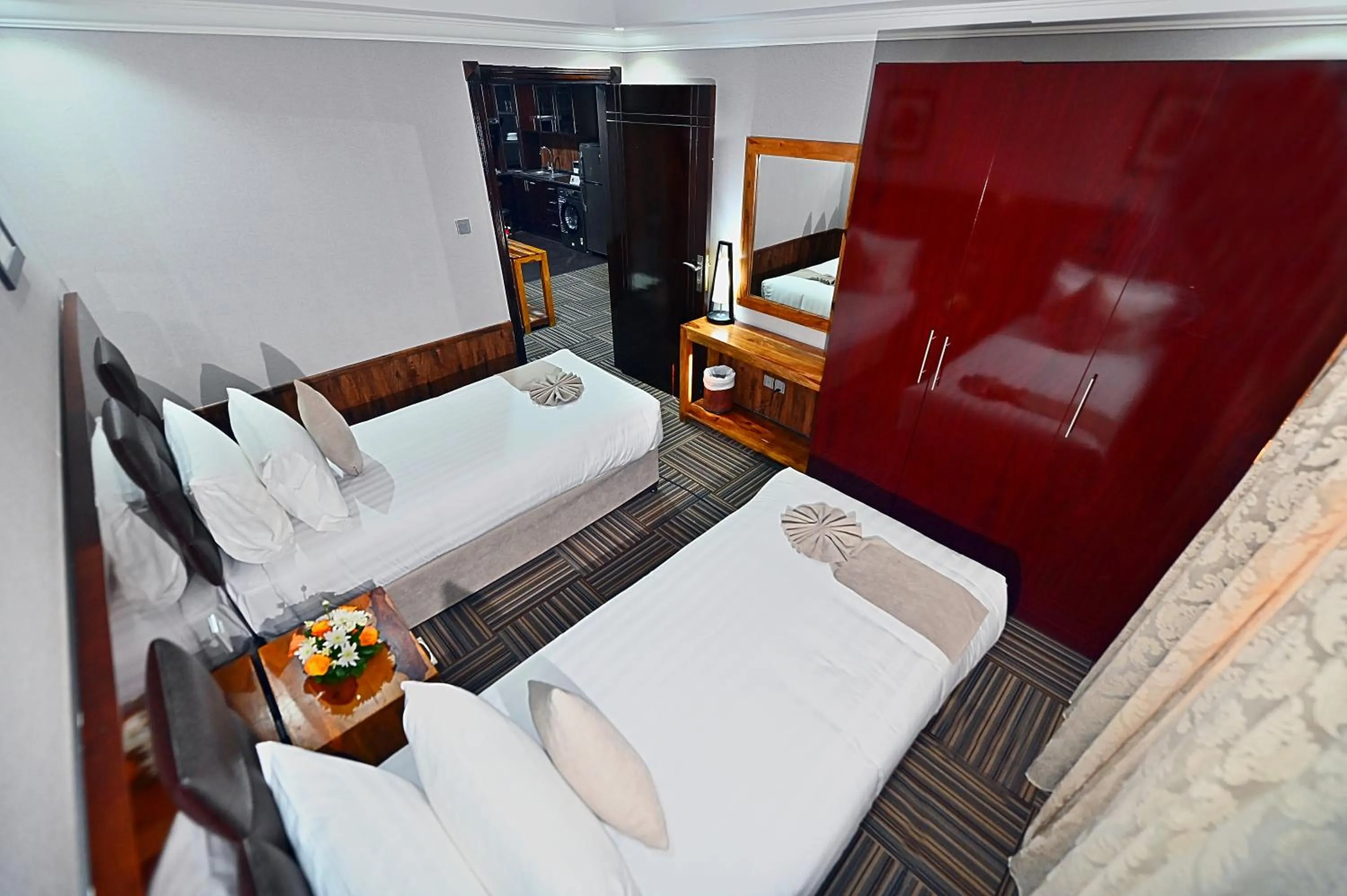 Bed in Ewan Ajman Suites Hotel