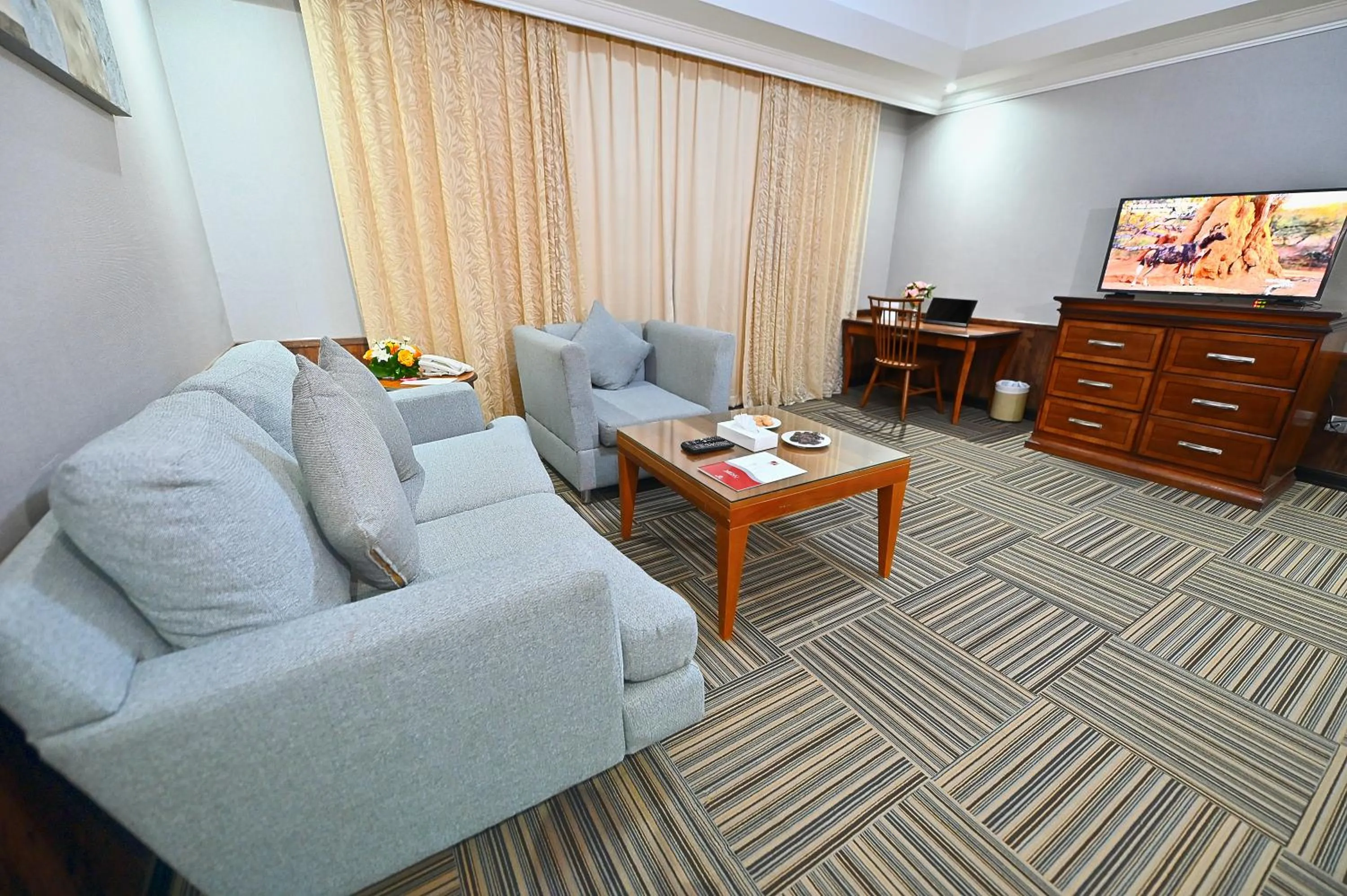 Living room in Ewan Ajman Suites Hotel