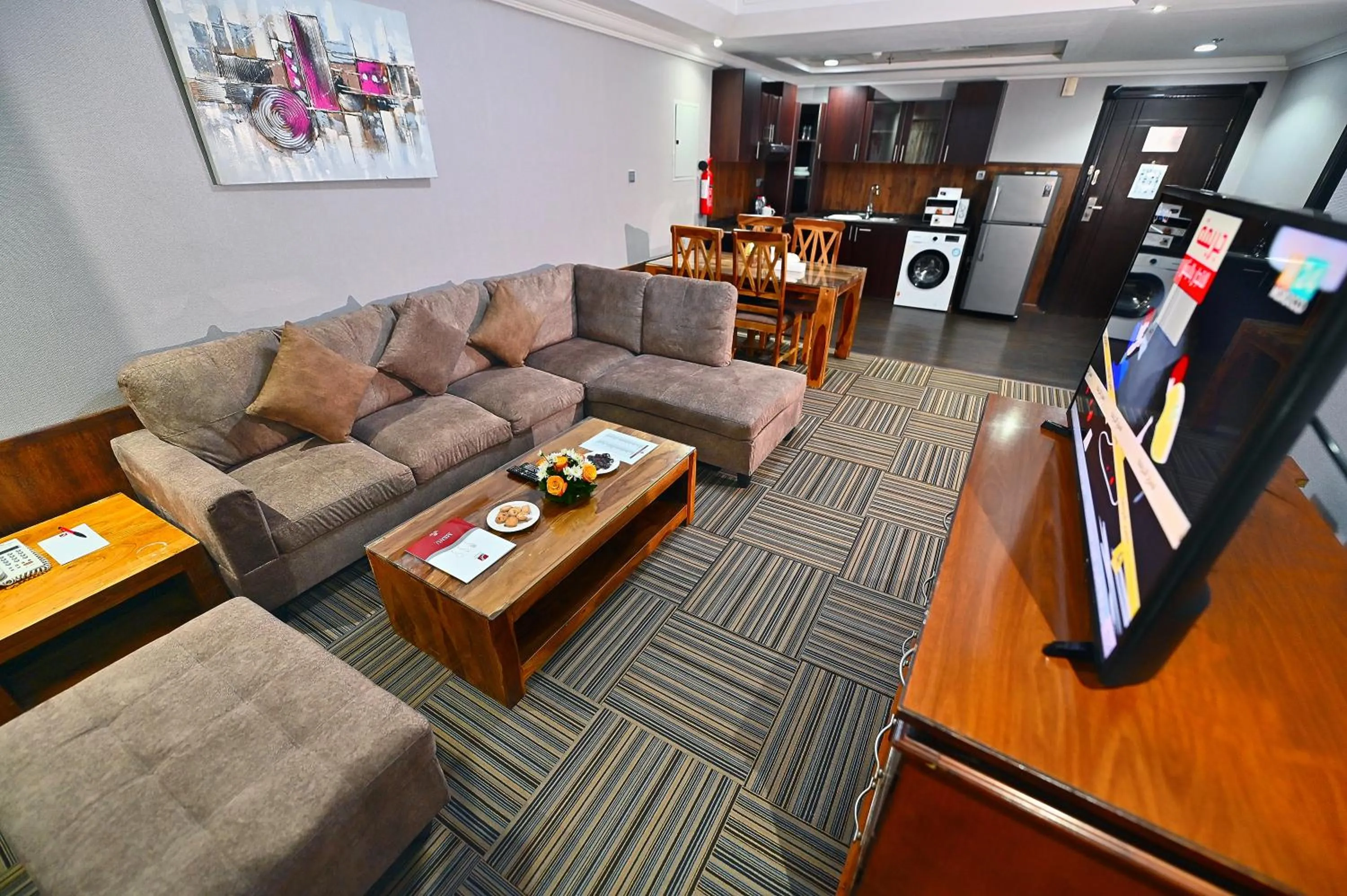 Kitchen or kitchenette in Ewan Ajman Suites Hotel