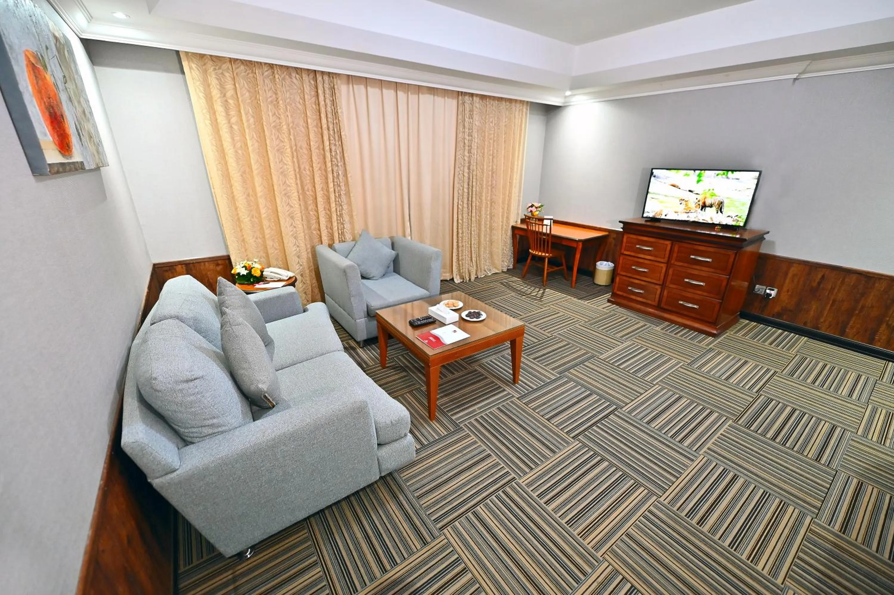 Living room in Ewan Ajman Suites Hotel
