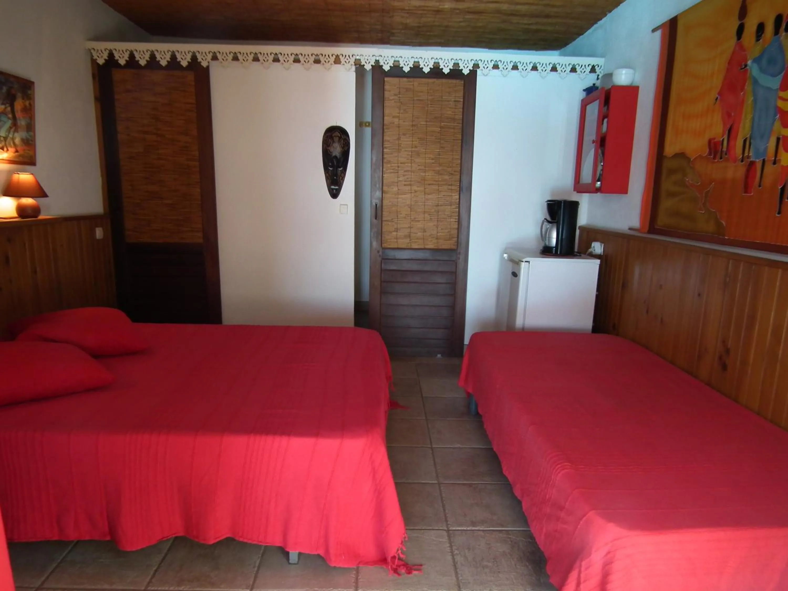 Bed in Le Cardinal des Grands Bleus