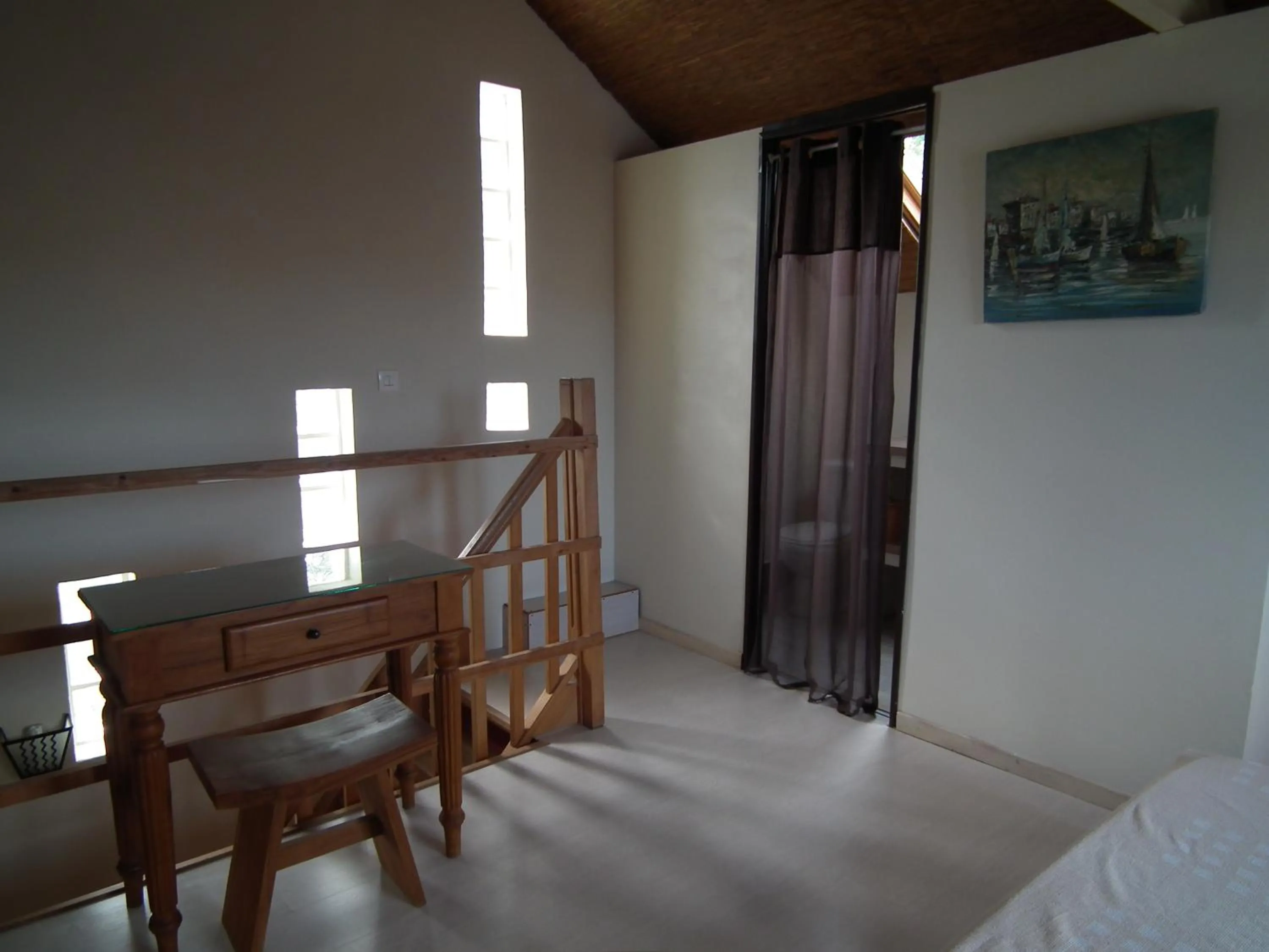 Bed in Le Cardinal des Grands Bleus