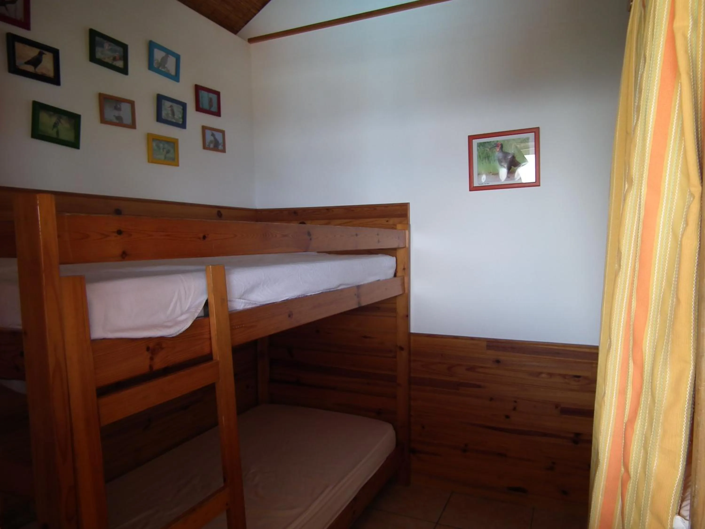 Bed in Le Cardinal des Grands Bleus