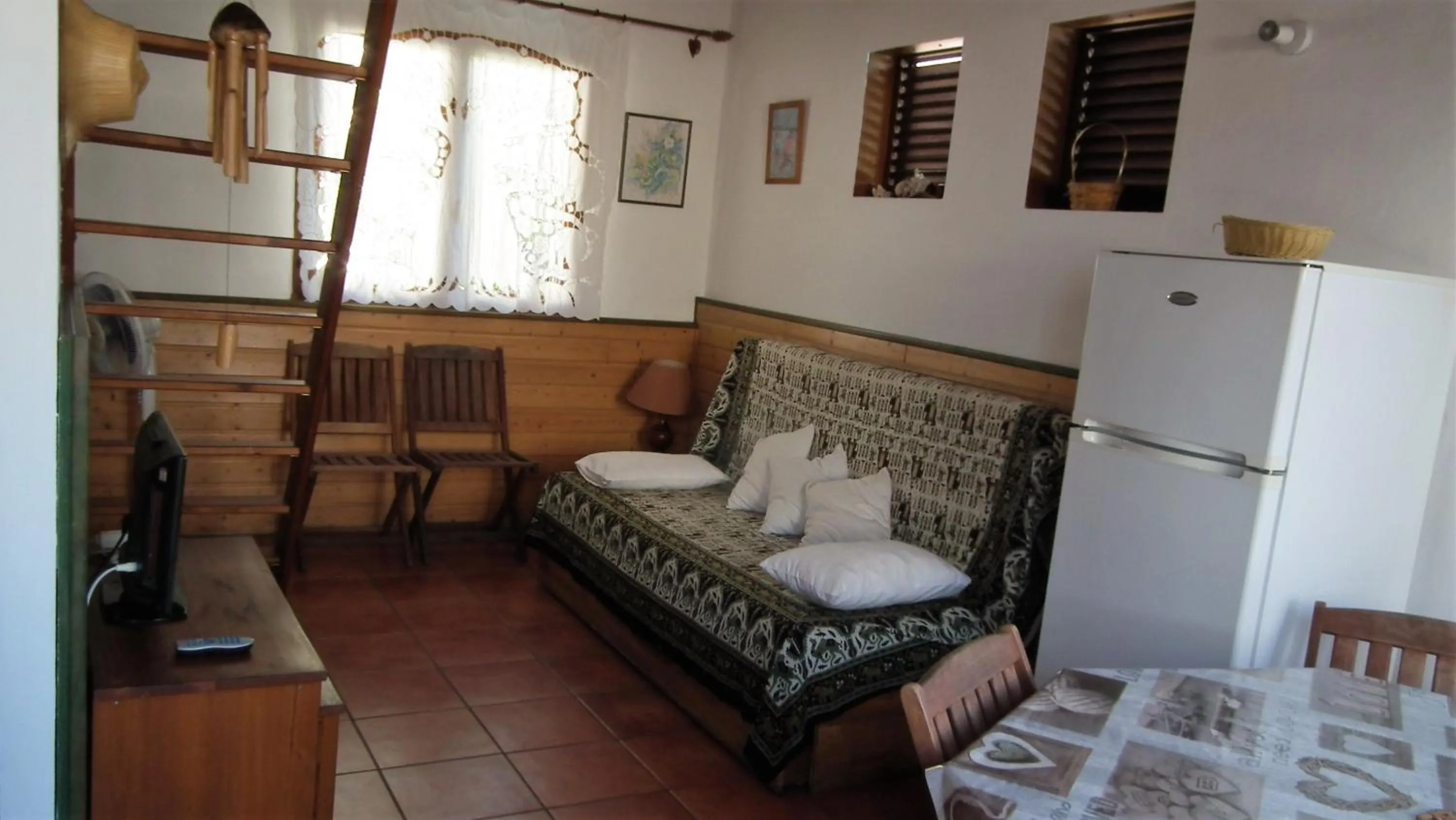 Bed in Le Cardinal des Grands Bleus
