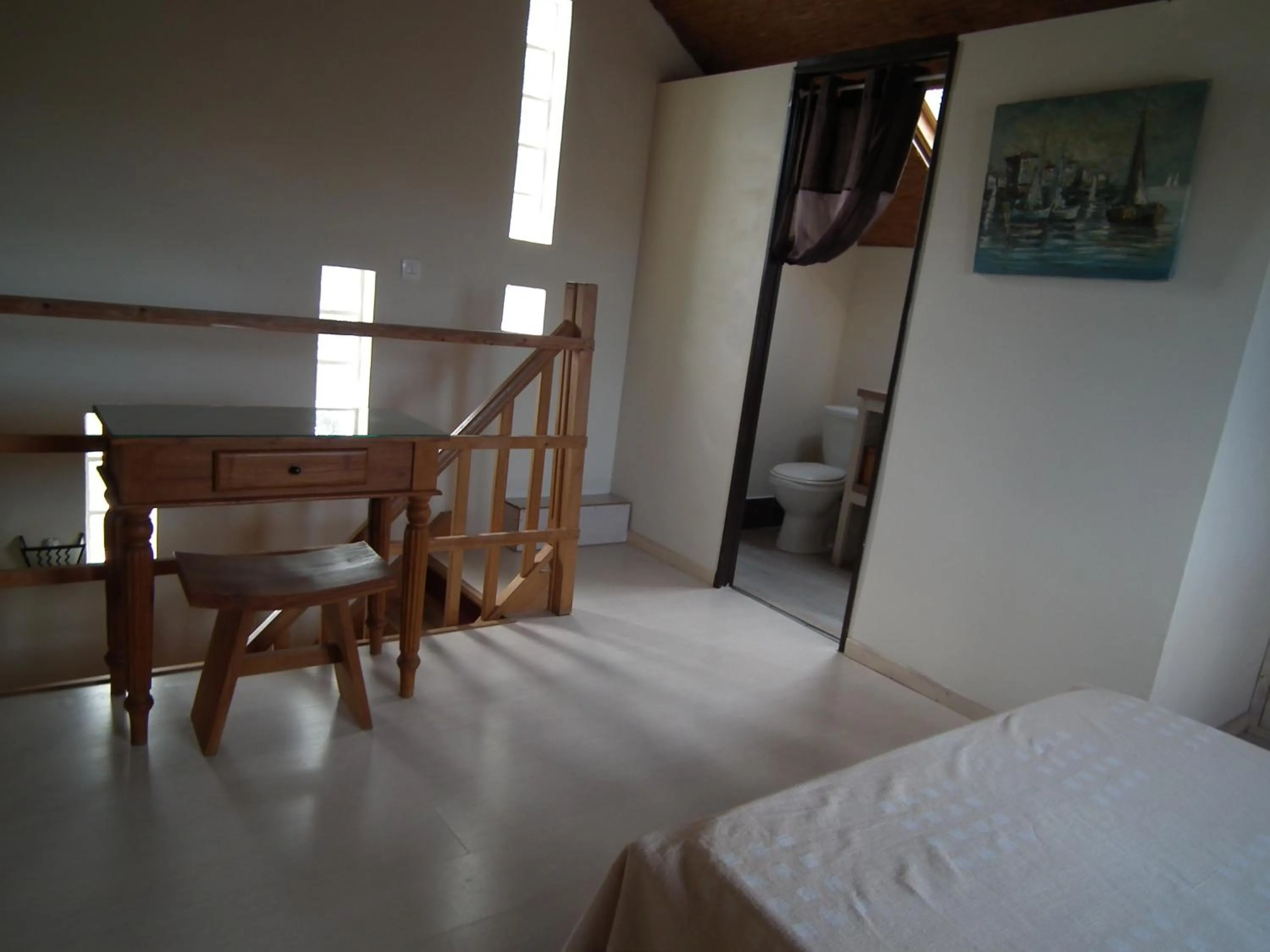 Bed in Le Cardinal des Grands Bleus