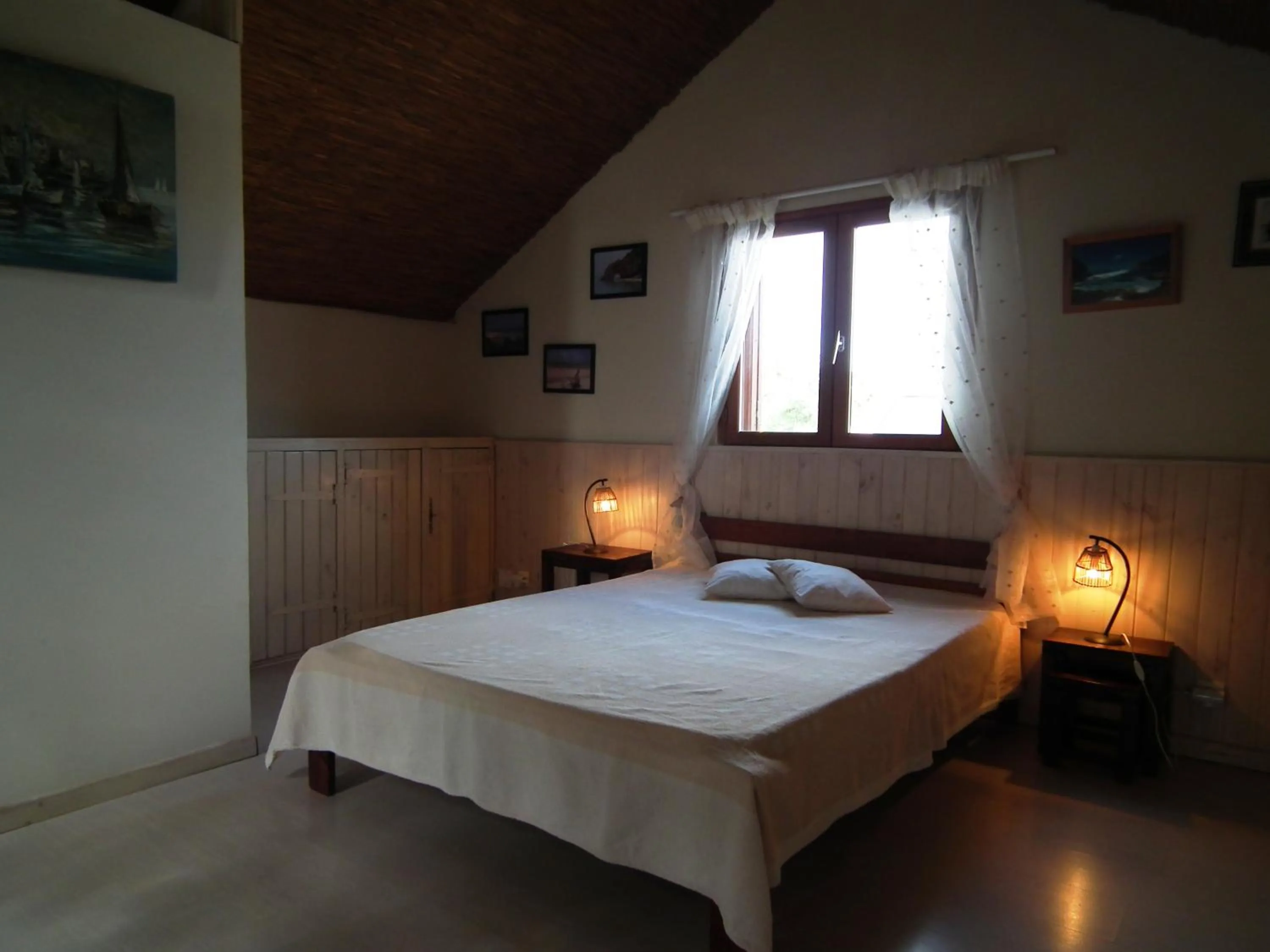 Bed in Le Cardinal des Grands Bleus