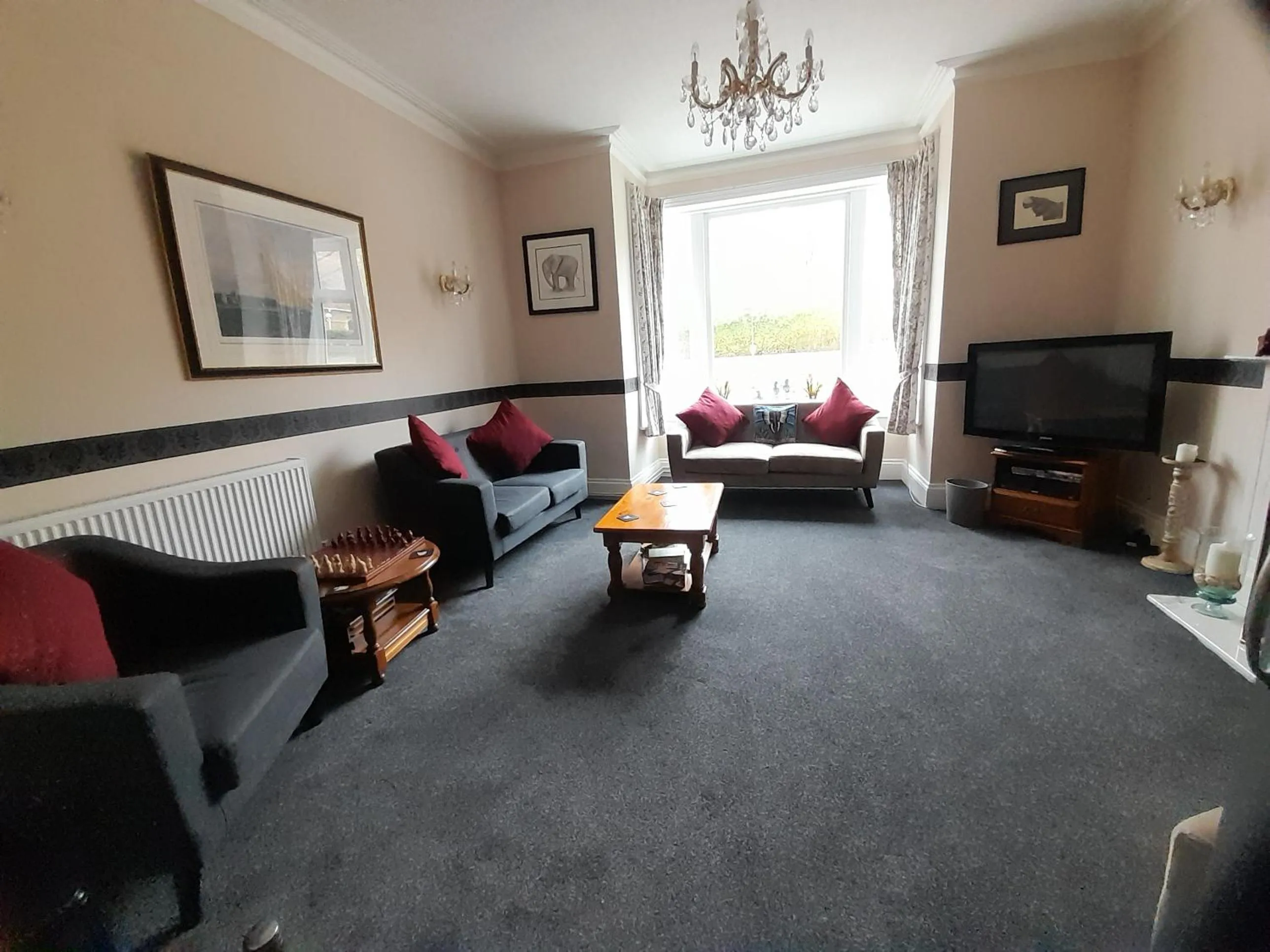 Communal lounge/ TV room in The Rosscourt