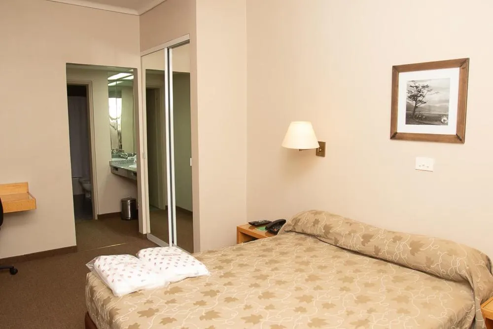 Bed in Comodoro Hotel