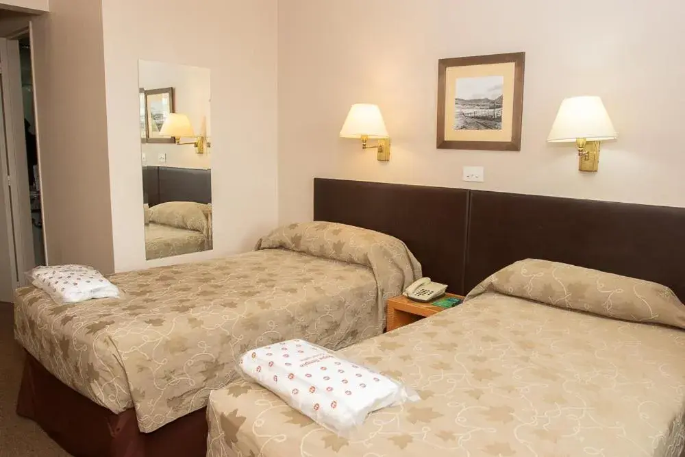 Bed in Comodoro Hotel Bed in Comodoro Hotel