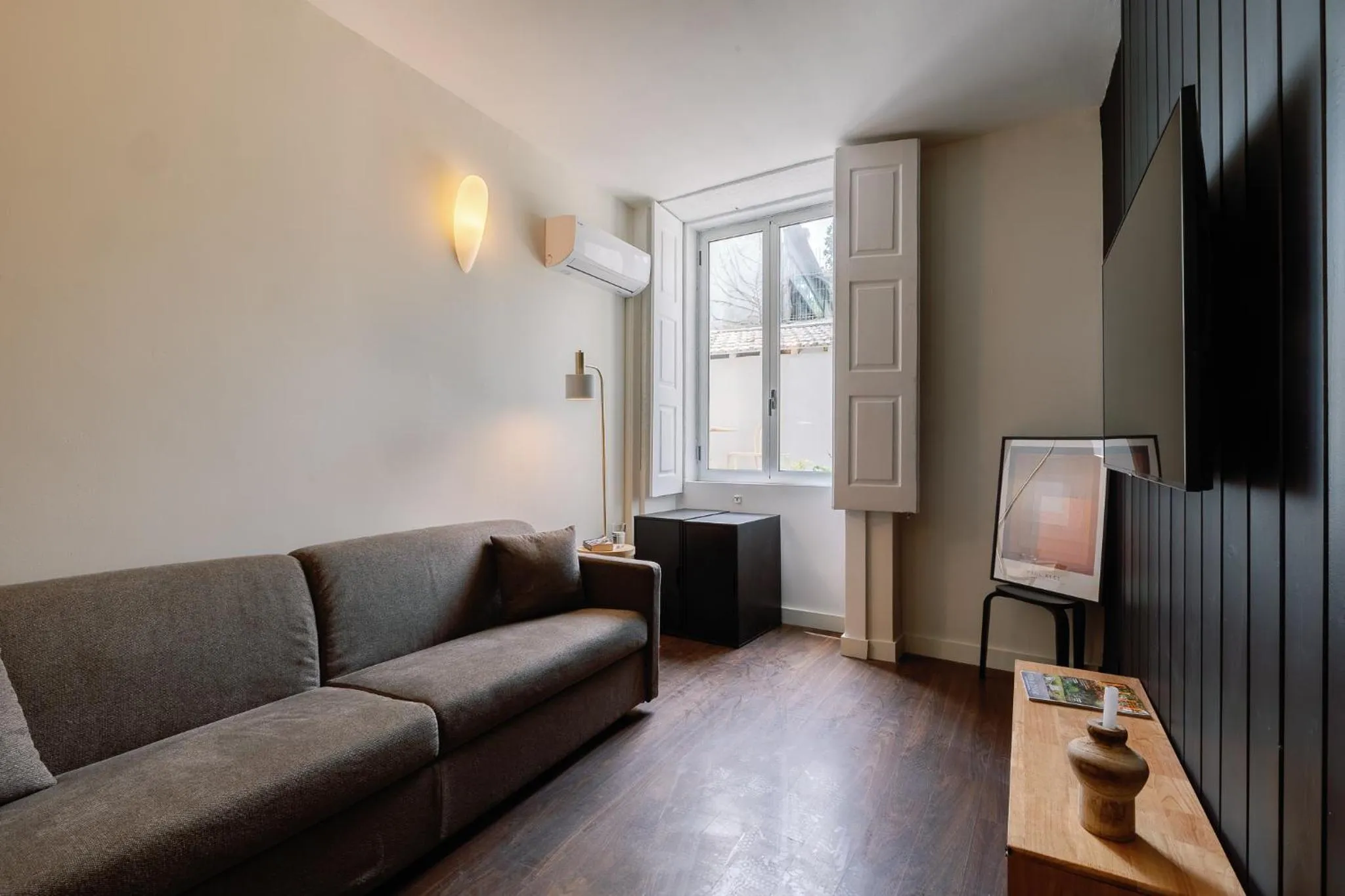 Living room in Cosme Apartments by Olala Homes